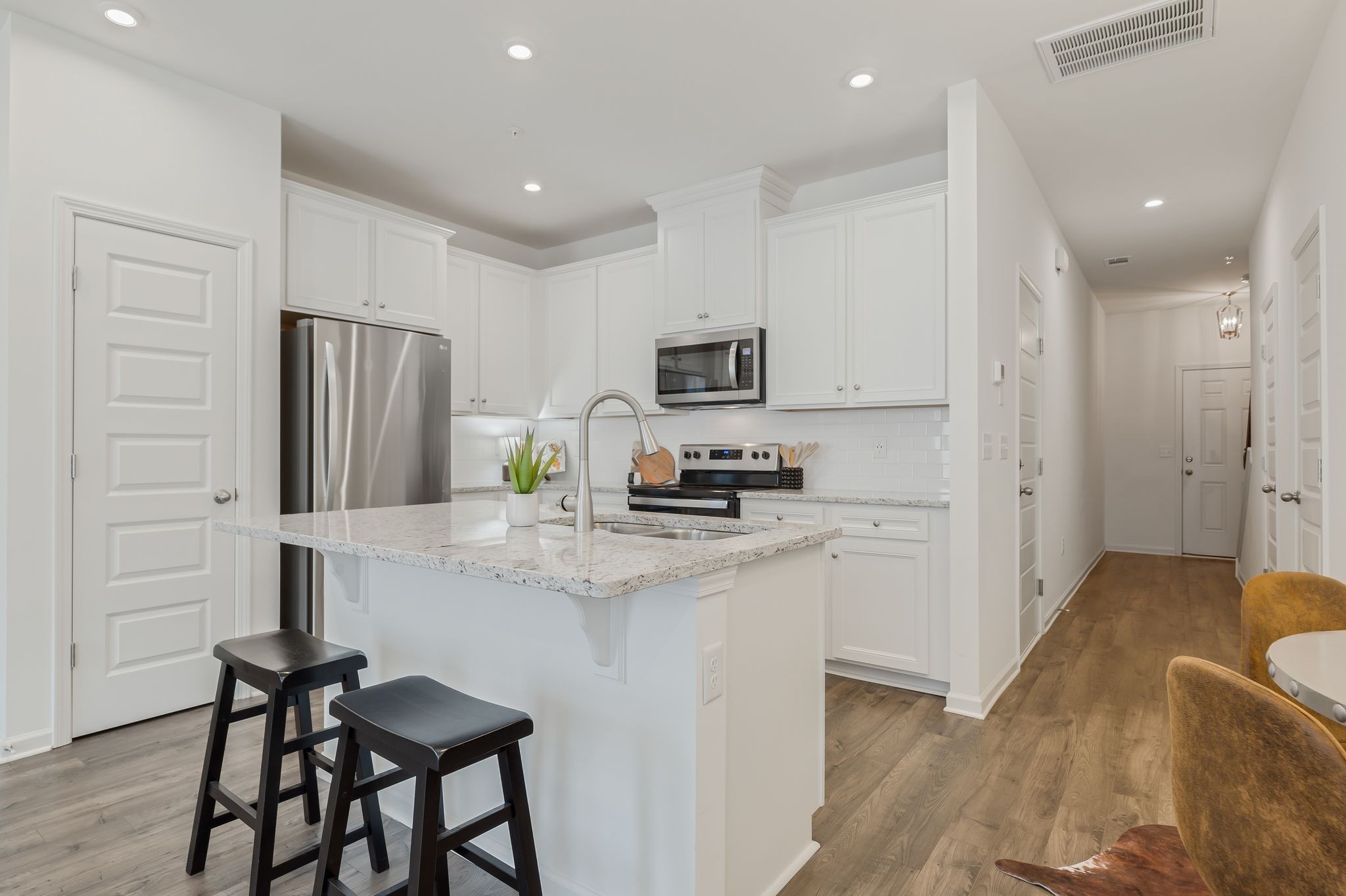 3419 Deerchase Circle Murfreesboro, TN 37129 - Photo 11 of 37 a kitchen with stainless steel appliances a refrigerator and a stove top oven