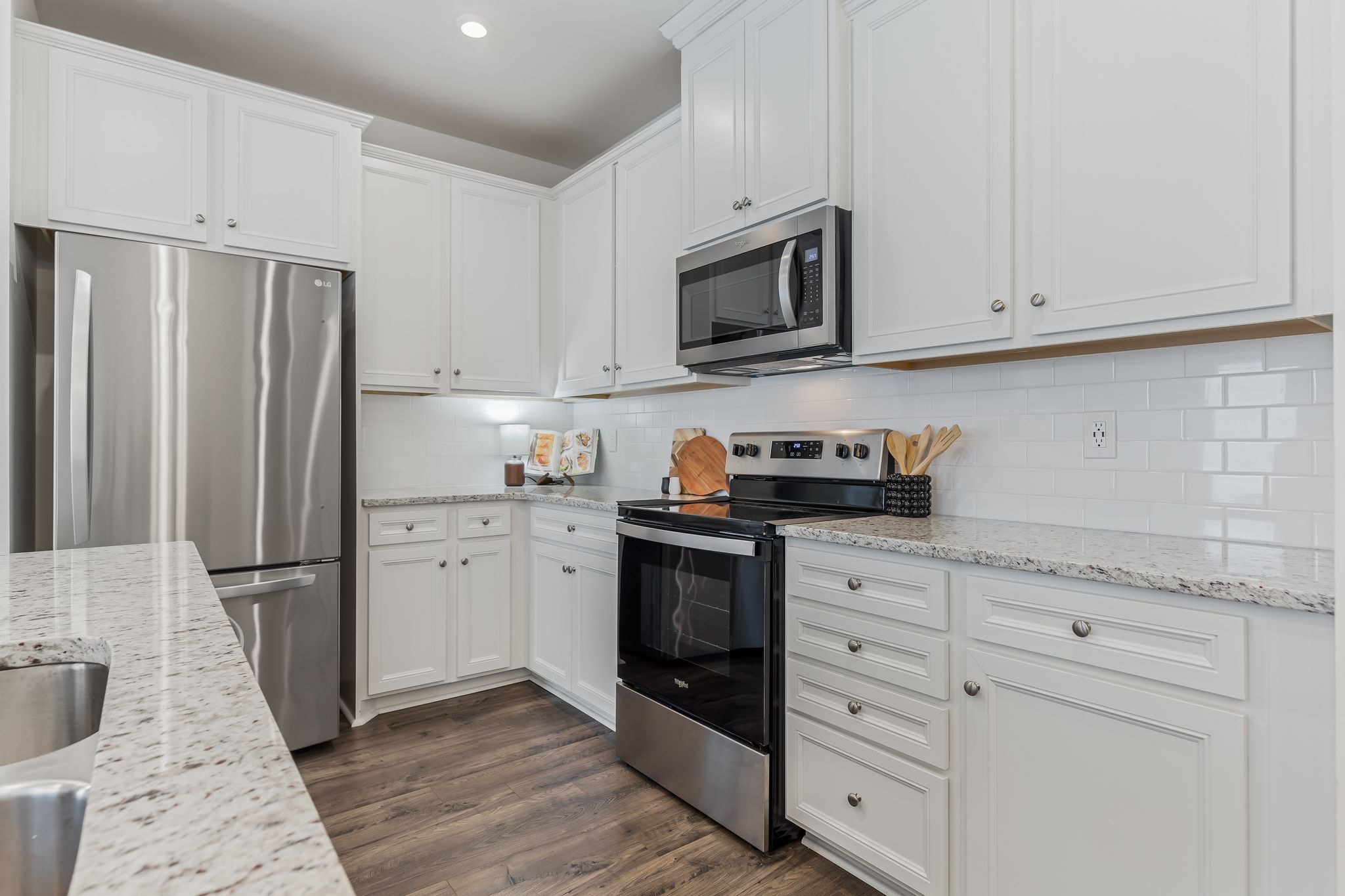 3419 Deerchase Circle Murfreesboro, TN 37129 - Photo 15 of 37 a kitchen with white cabinets stainless steel appliances and a sink