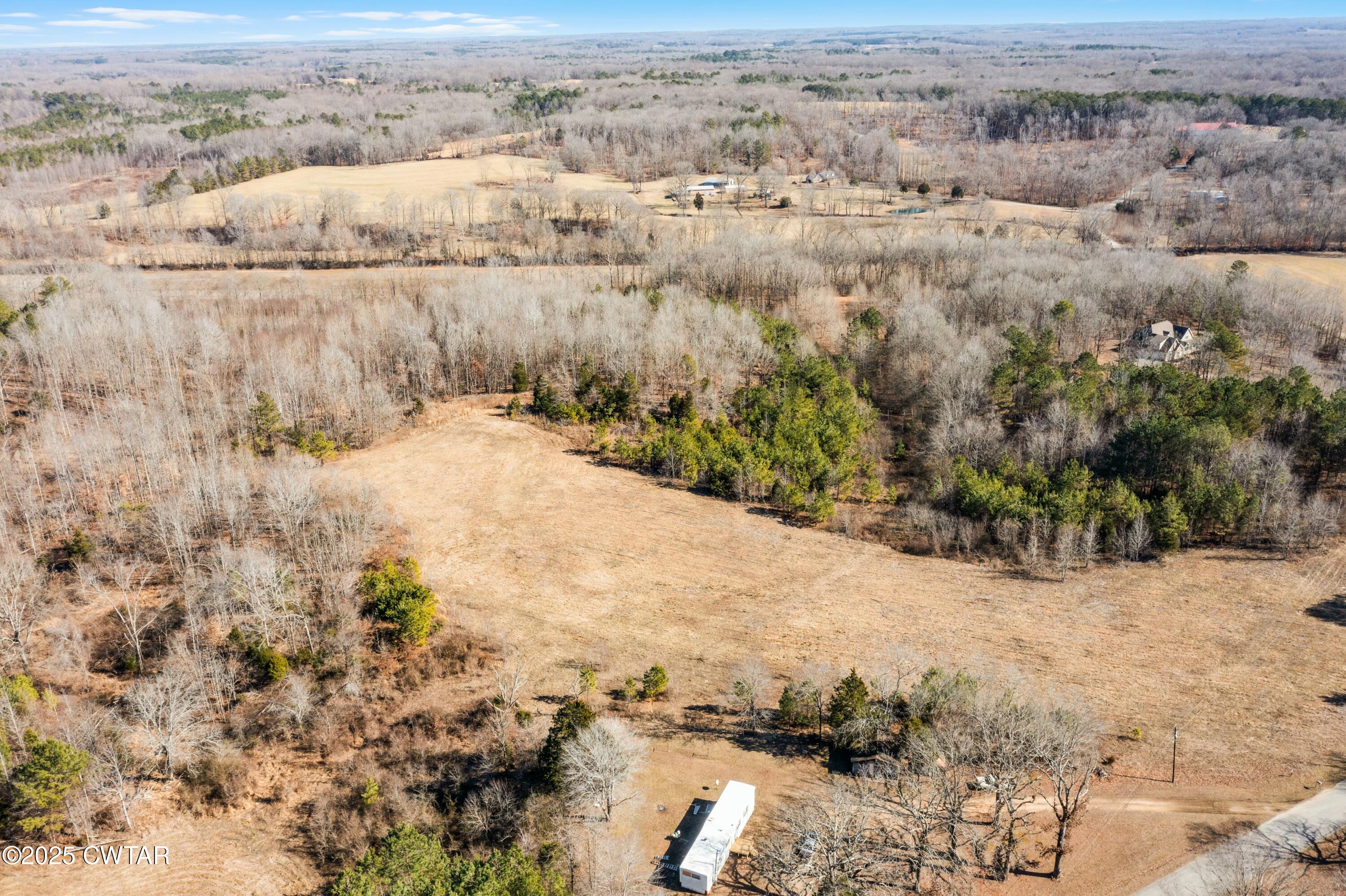 0 New Friendship Road Beech Bluff, TN 38313 - Photo 11 of 11 an aerial view of house with yard