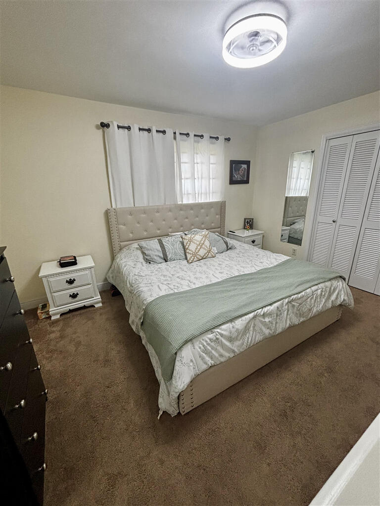 1032 Windy Ridge Drive Bedford, VA 24523 - Photo 13 of 27 a bedroom with a bed and window