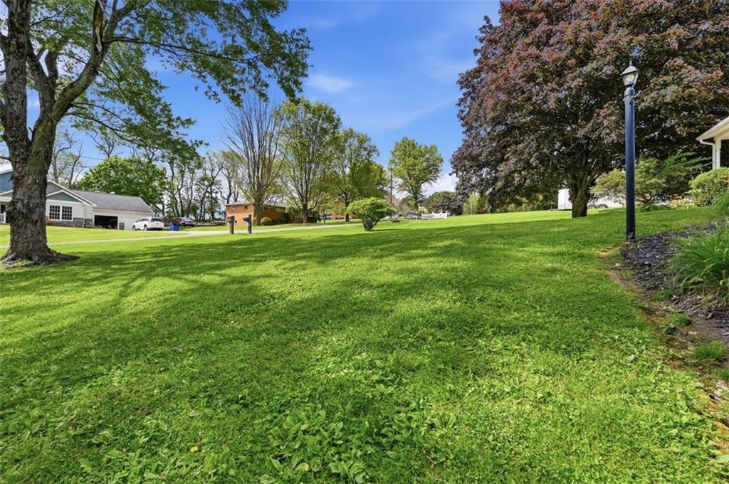 129 Meadowbrook Road Renfrew, PA 16053 - Photo 43 of 45 a view of grassy field with trees