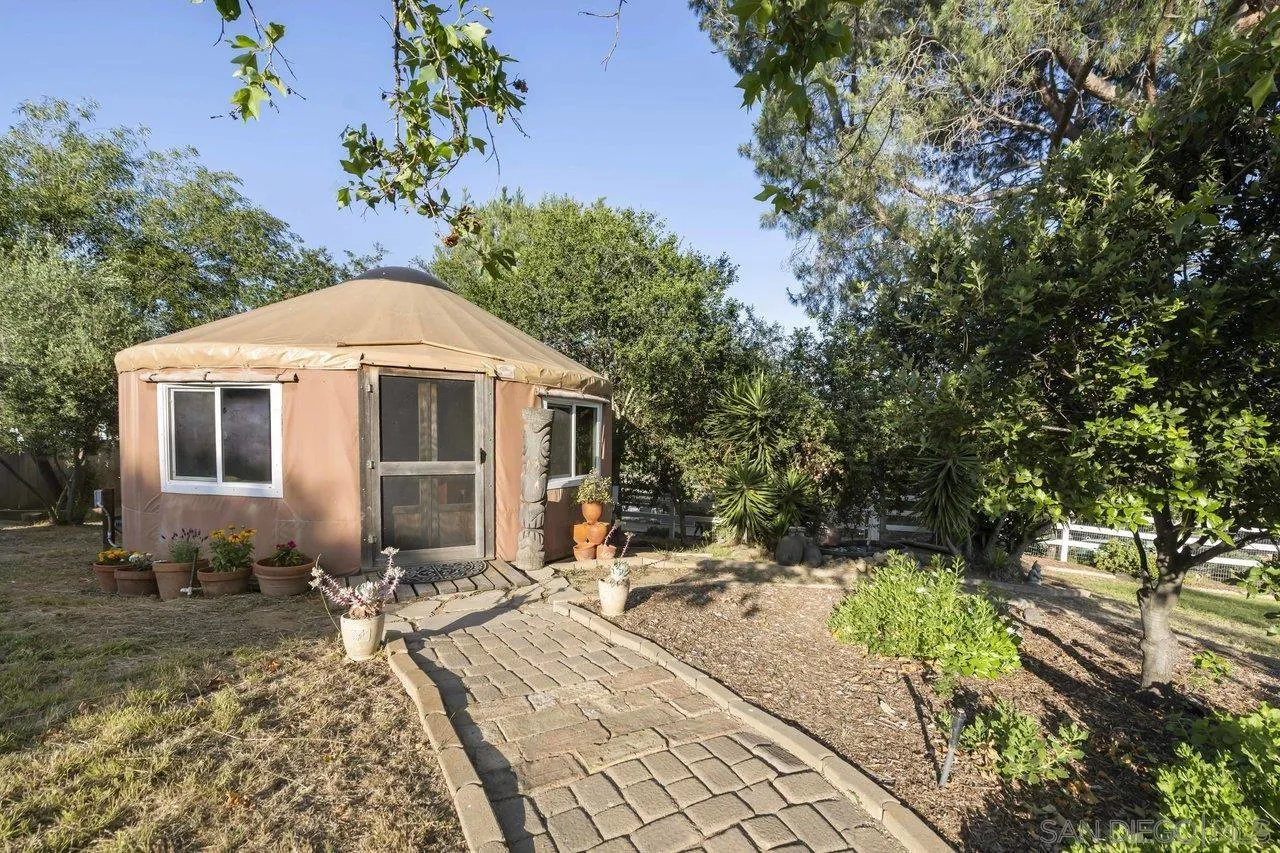 2952 Milpas Drive Escondido, CA 92029 - Photo 18 of 33 a front view of a house with garden