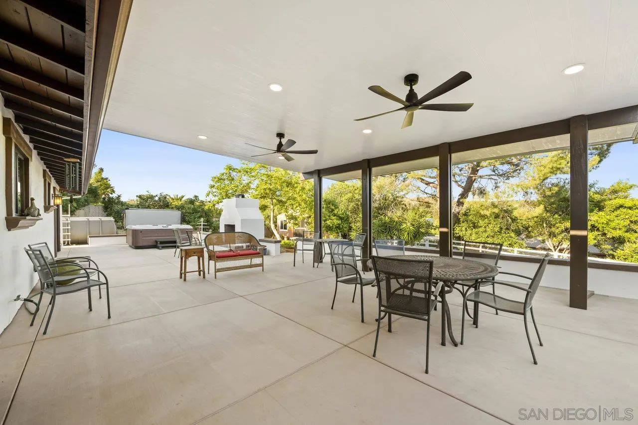 2952 Milpas Drive Escondido, CA 92029 - Photo 22 of 33 a living room with furniture and a large window