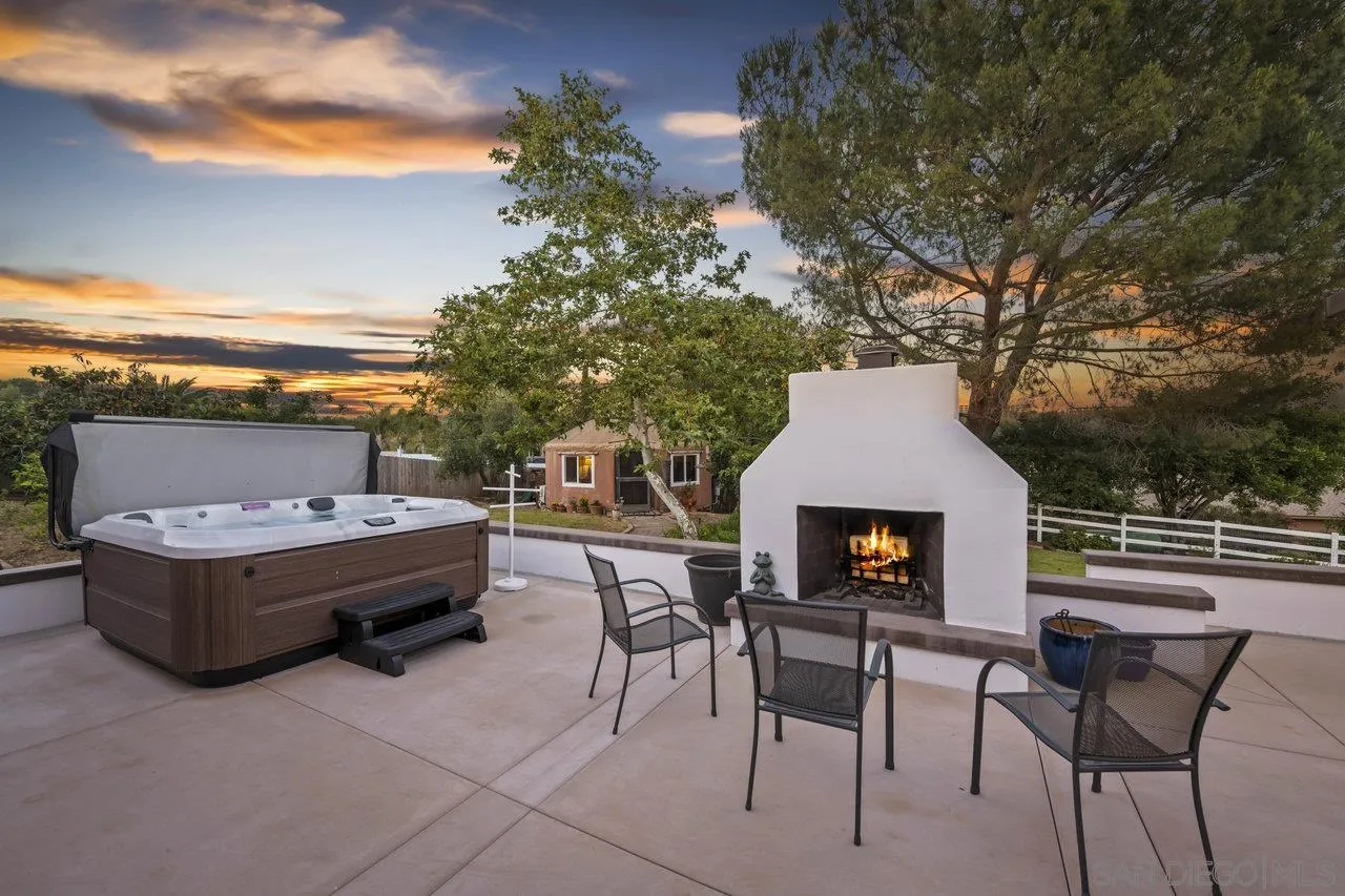 2952 Milpas Drive Escondido, CA 92029 - Photo 24 of 33 a view of house with backyard and outdoor seating