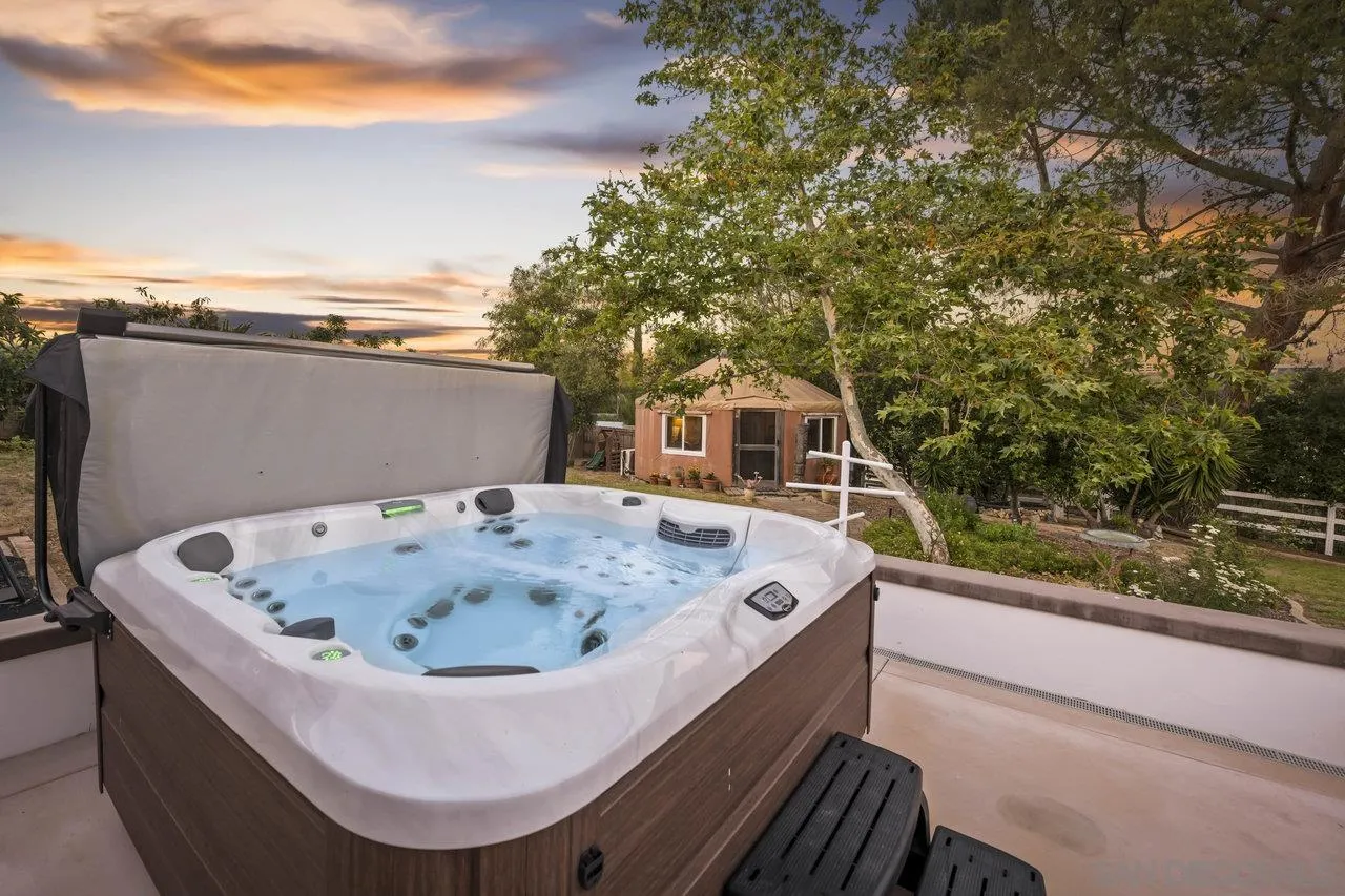 2952 Milpas Drive Escondido, CA 92029 - Photo 25 of 33 a roof deck with table and chairs