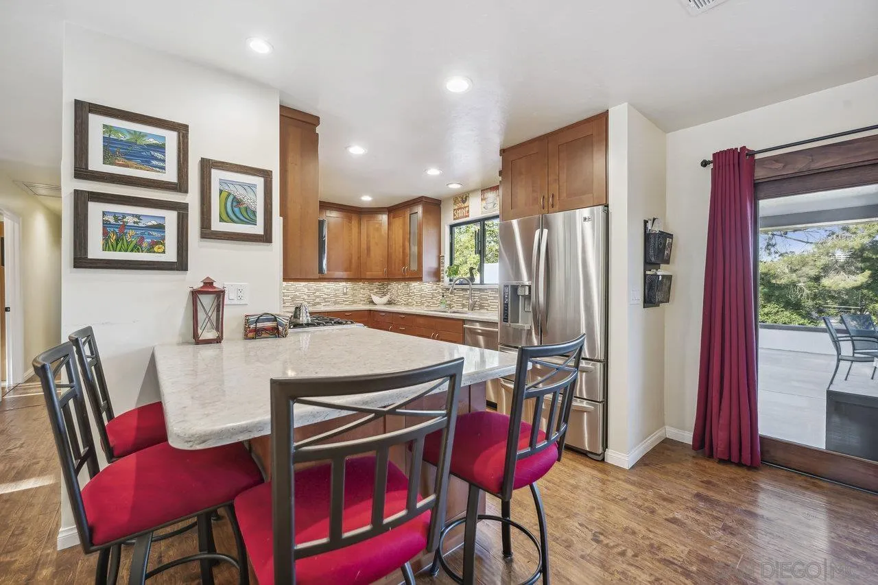 2952 Milpas Drive Escondido, CA 92029 - Photo 7 of 33 a dining room with furniture and window
