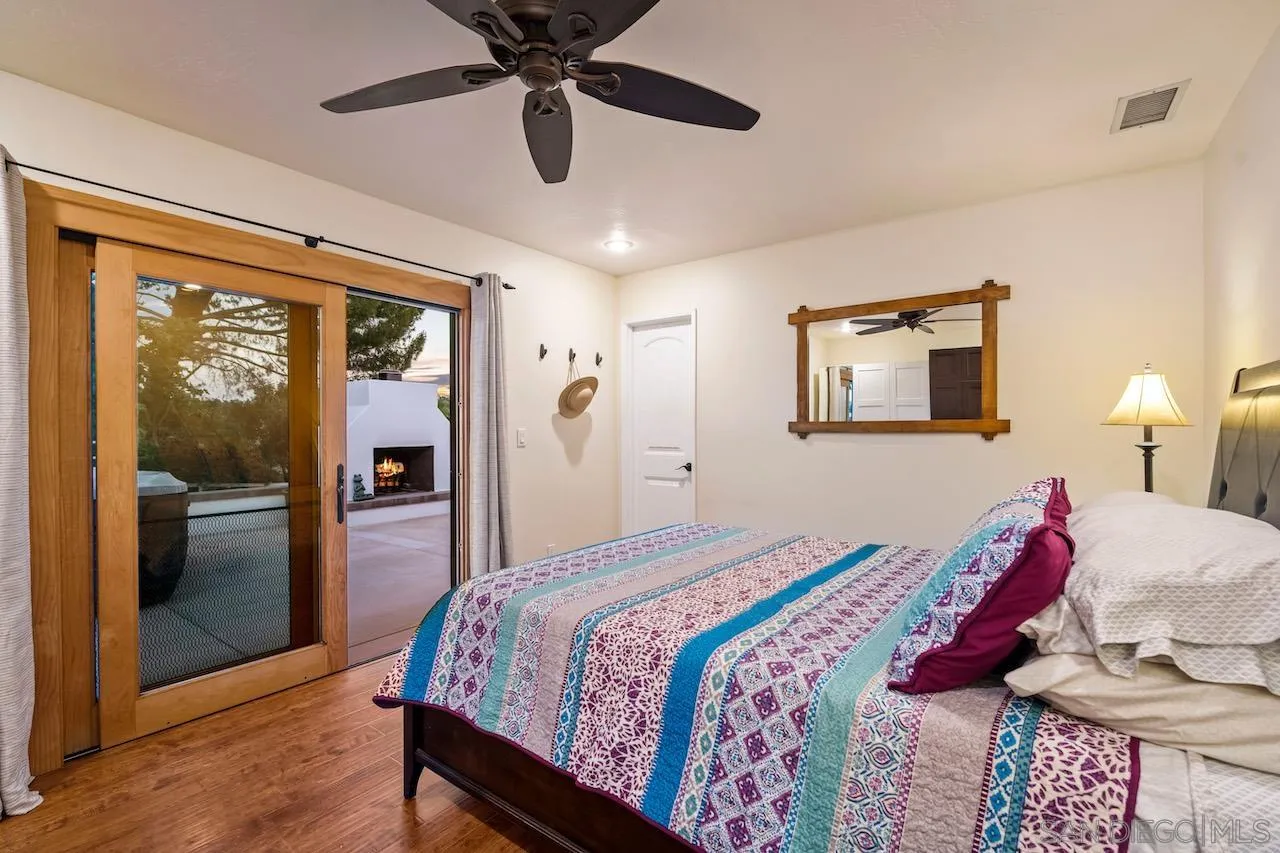 2952 Milpas Drive Escondido, CA 92029 - Photo 10 of 33 a bedroom with a bed and a walk in closet