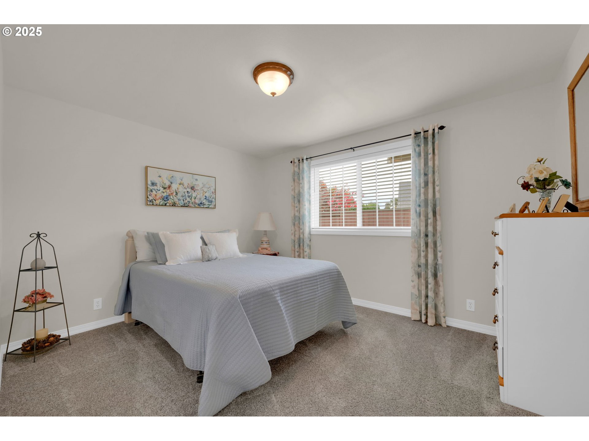 2458 Otto Street Springfield, OR 97477 - Photo 18 of 37 a bedroom with a bed and a window