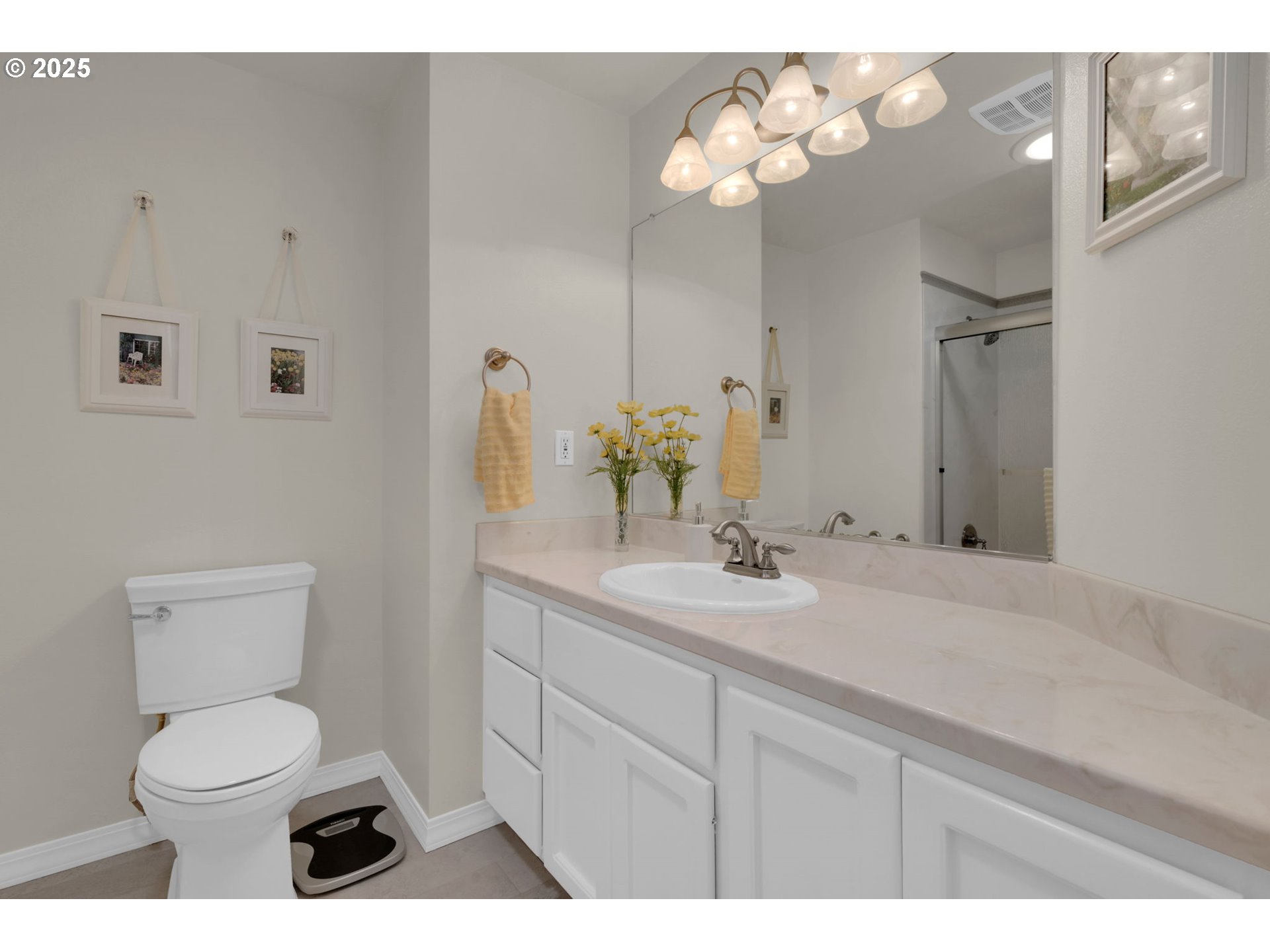 2458 Otto Street Springfield, OR 97477 - Photo 20 of 37 a bathroom with a toilet sink and mirror