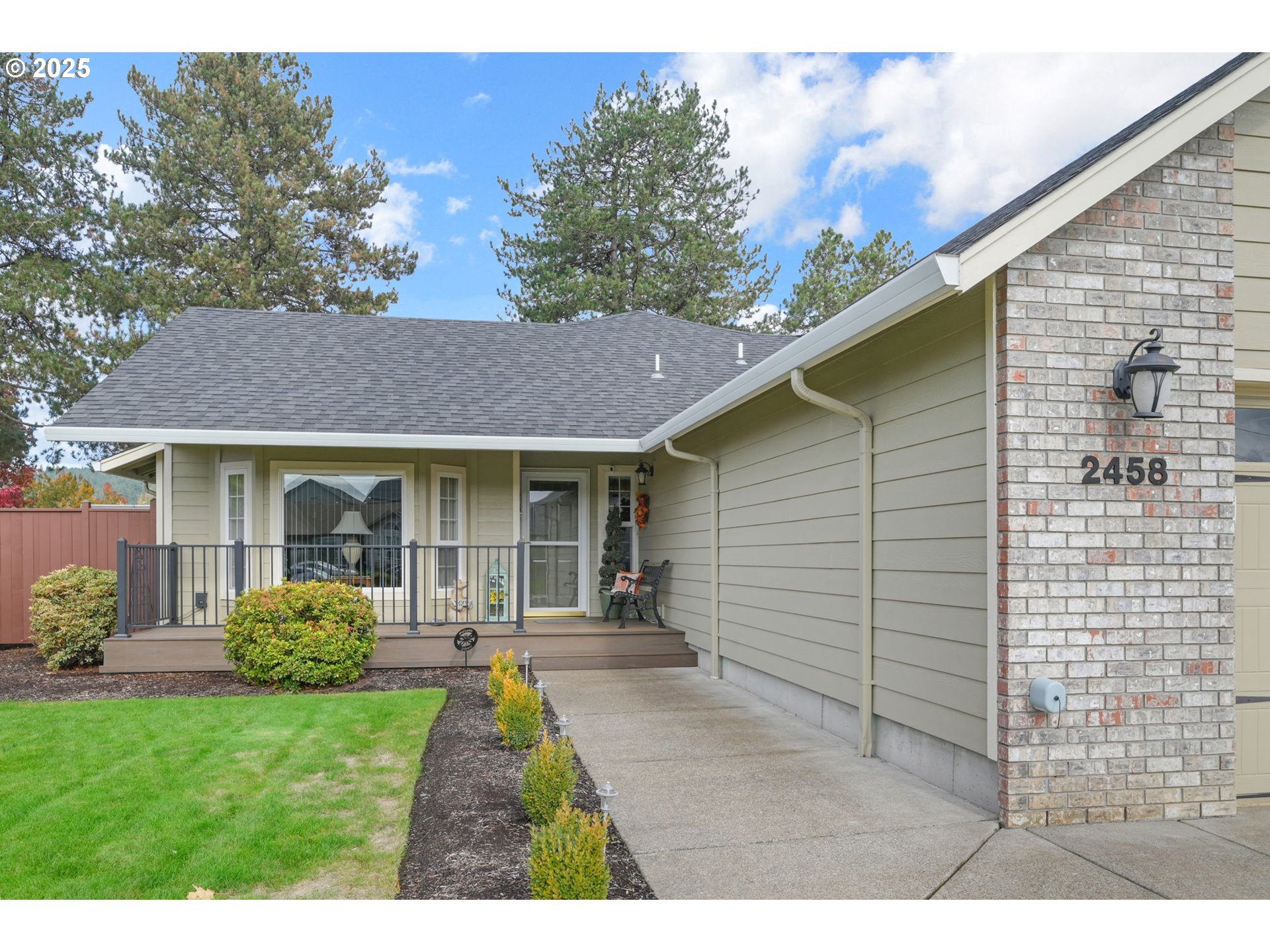 2458 Otto Street Springfield, OR 97477 - Photo 2 of 37 a front view of a house with garden