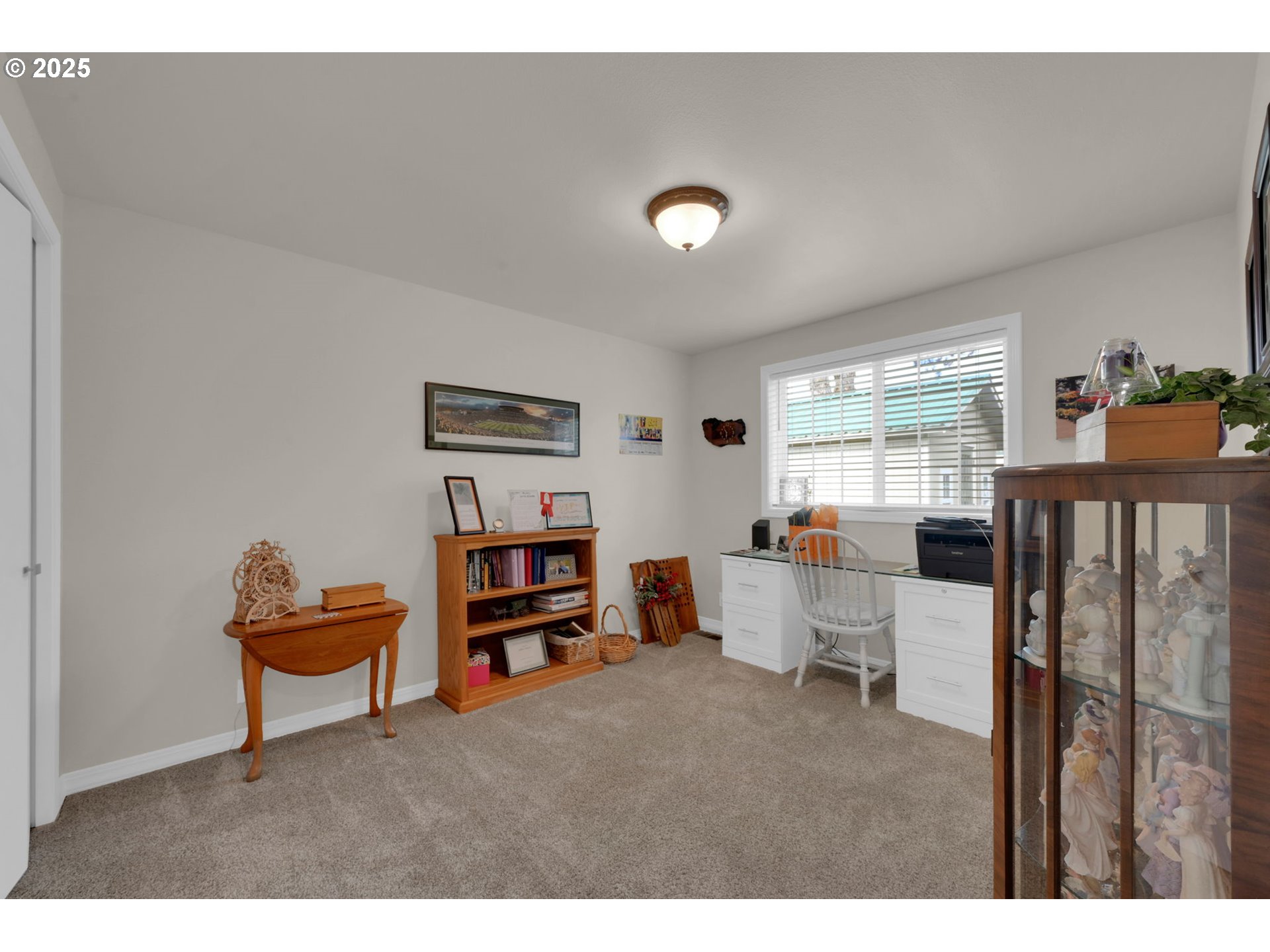 2458 Otto Street Springfield, OR 97477 - Photo 21 of 37 a living room with furniture and a window