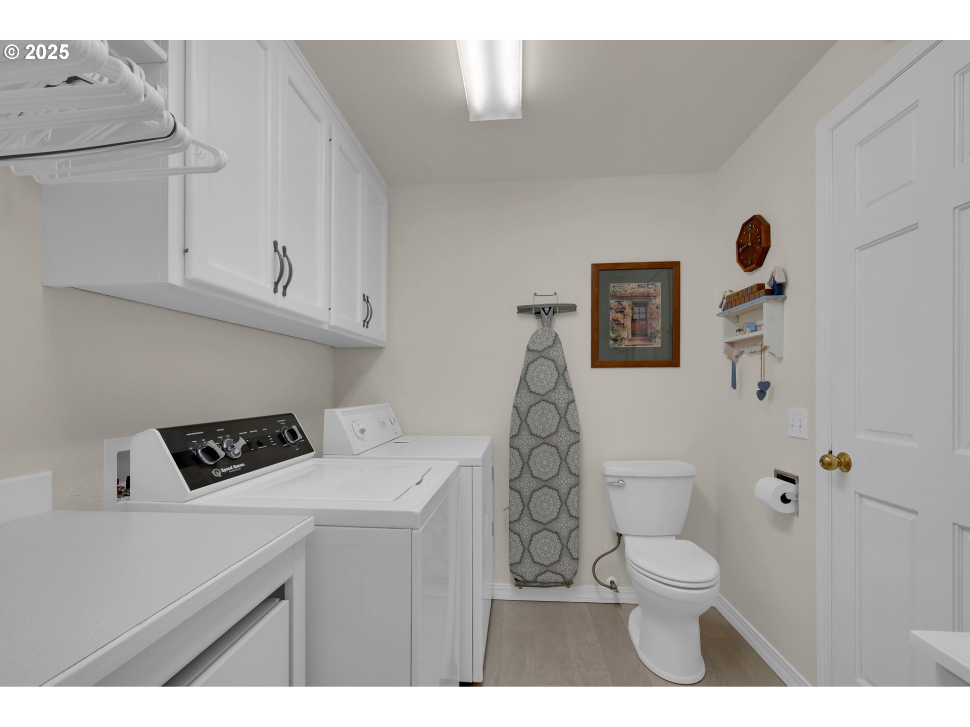 2458 Otto Street Springfield, OR 97477 - Photo 25 of 37 a bathroom with a sink a toilet and mirror