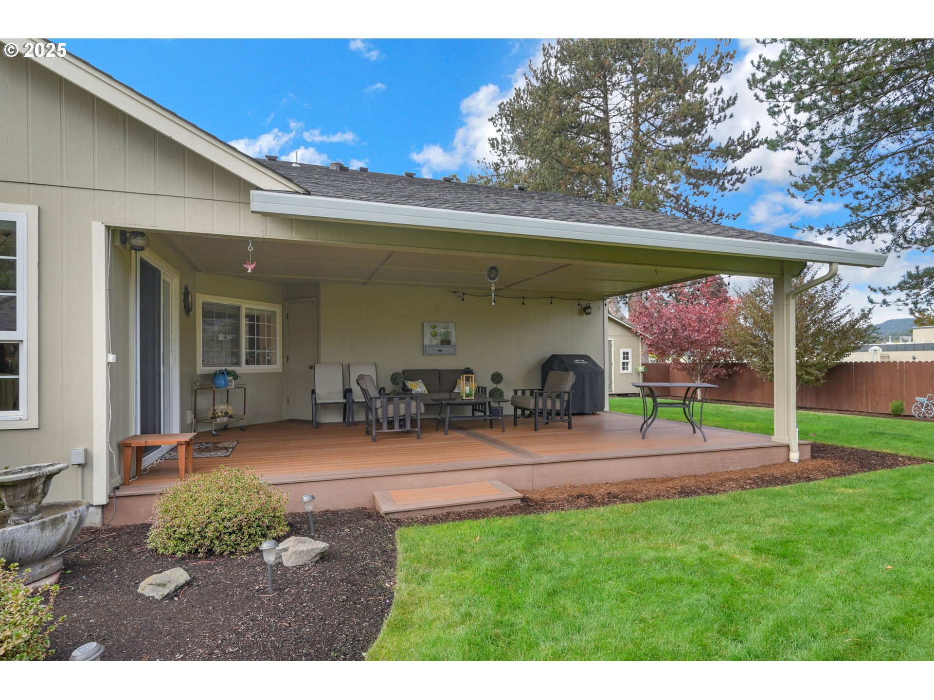 2458 Otto Street Springfield, OR 97477 - Photo 27 of 37 a view of a porch with a tv