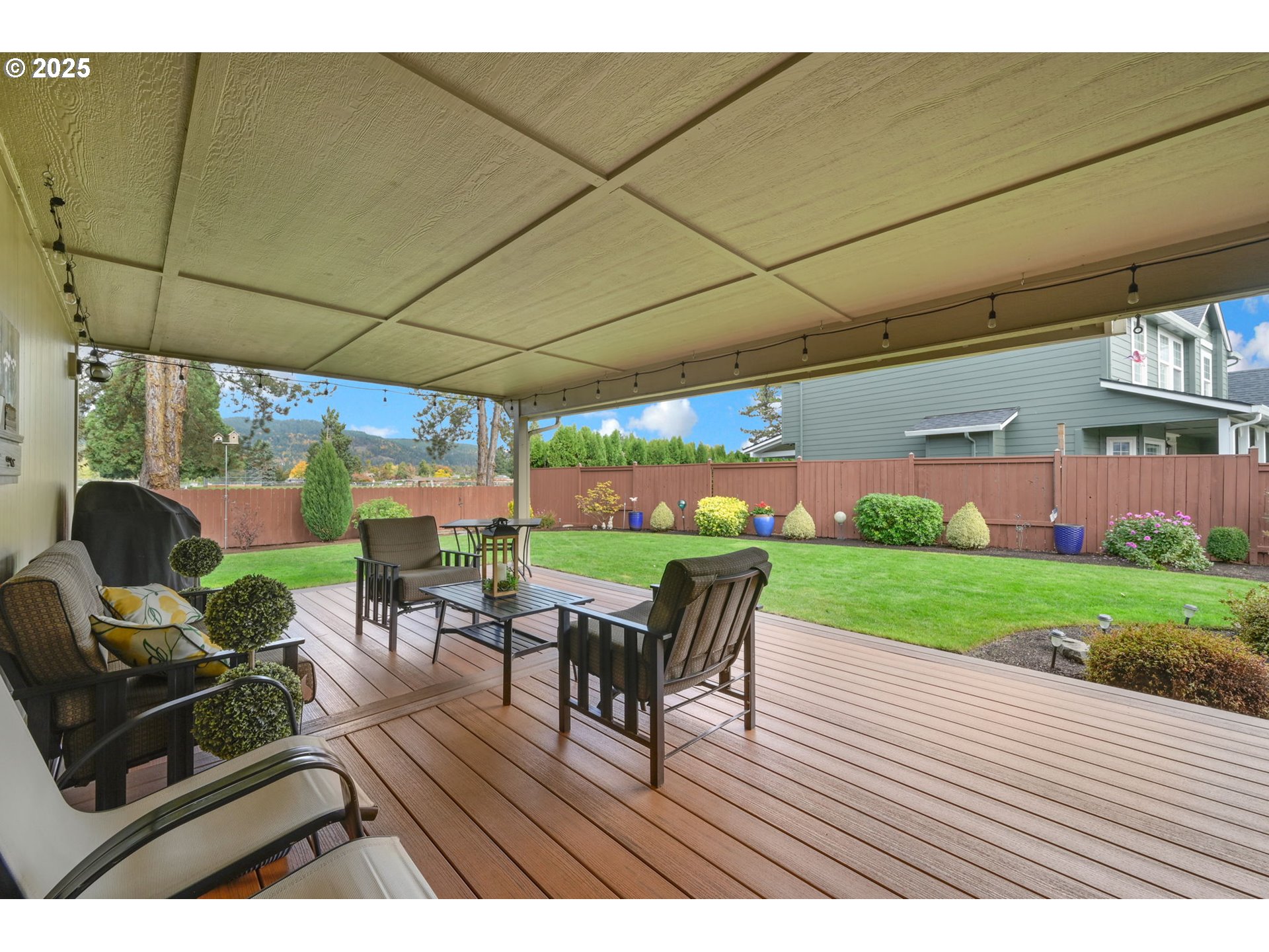 2458 Otto Street Springfield, OR 97477 - Photo 28 of 37 a view of a patio with a table chairs and a patio