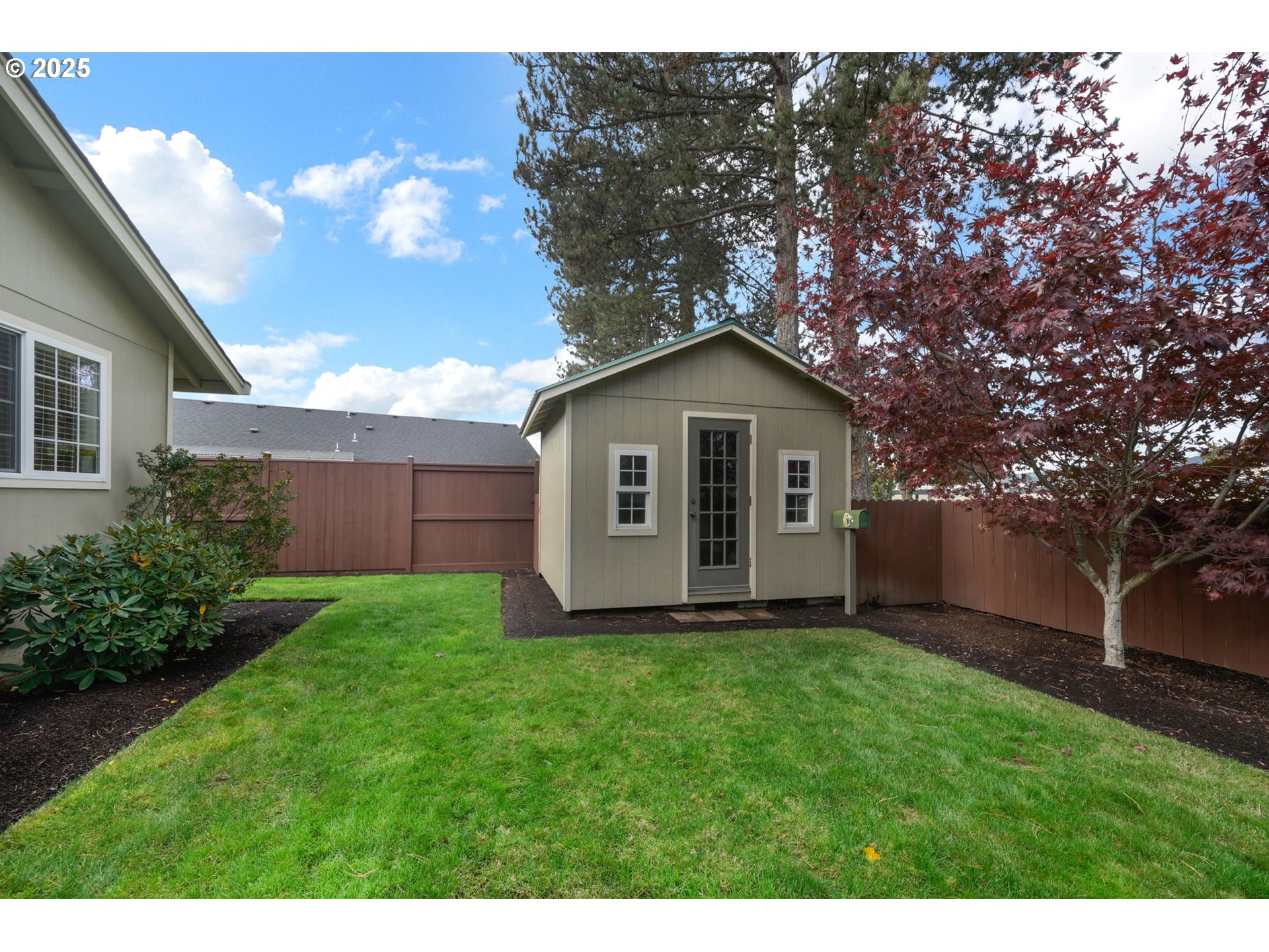 2458 Otto Street Springfield, OR 97477 - Photo 30 of 37 a house with green field in front of it