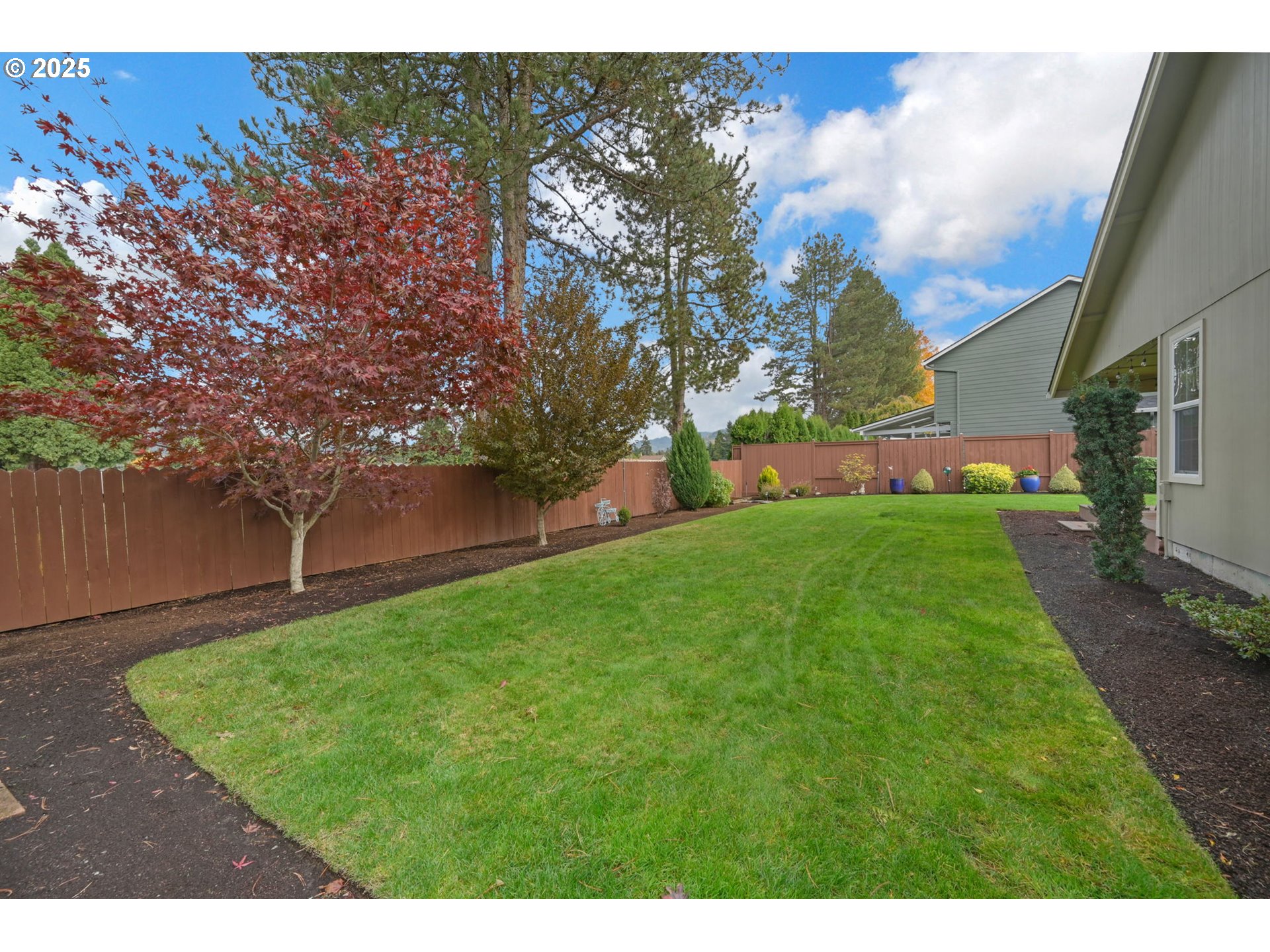 2458 Otto Street Springfield, OR 97477 - Photo 31 of 37 a view of an house with backyard space and garden