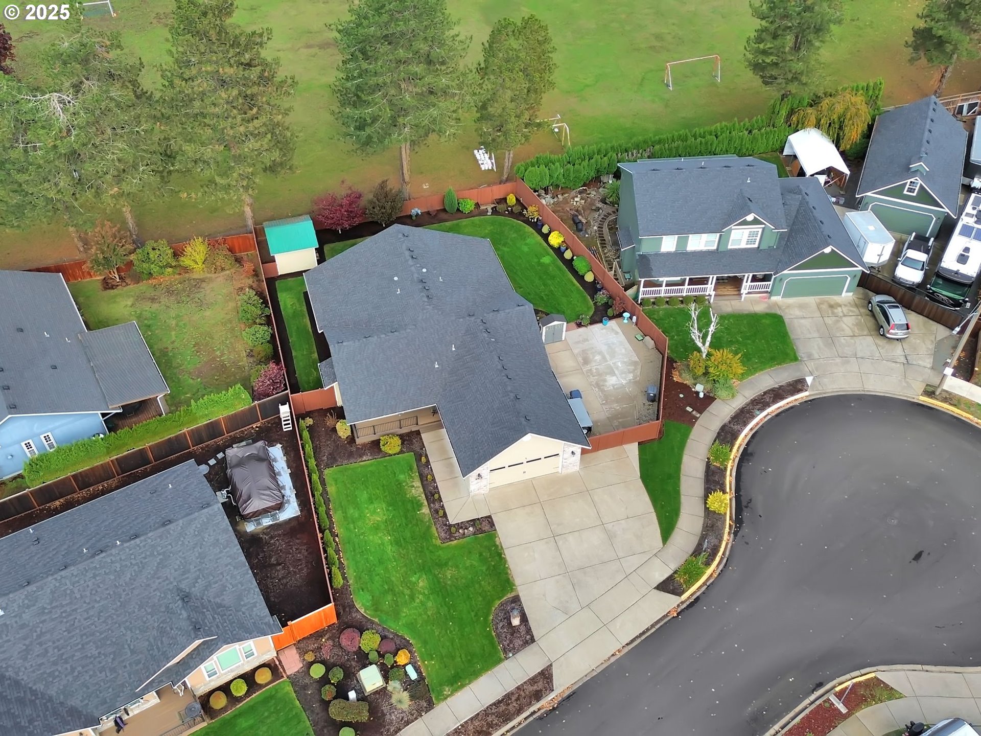 2458 Otto Street Springfield, OR 97477 - Photo 34 of 37 an aerial view of a house with a yard and lake view