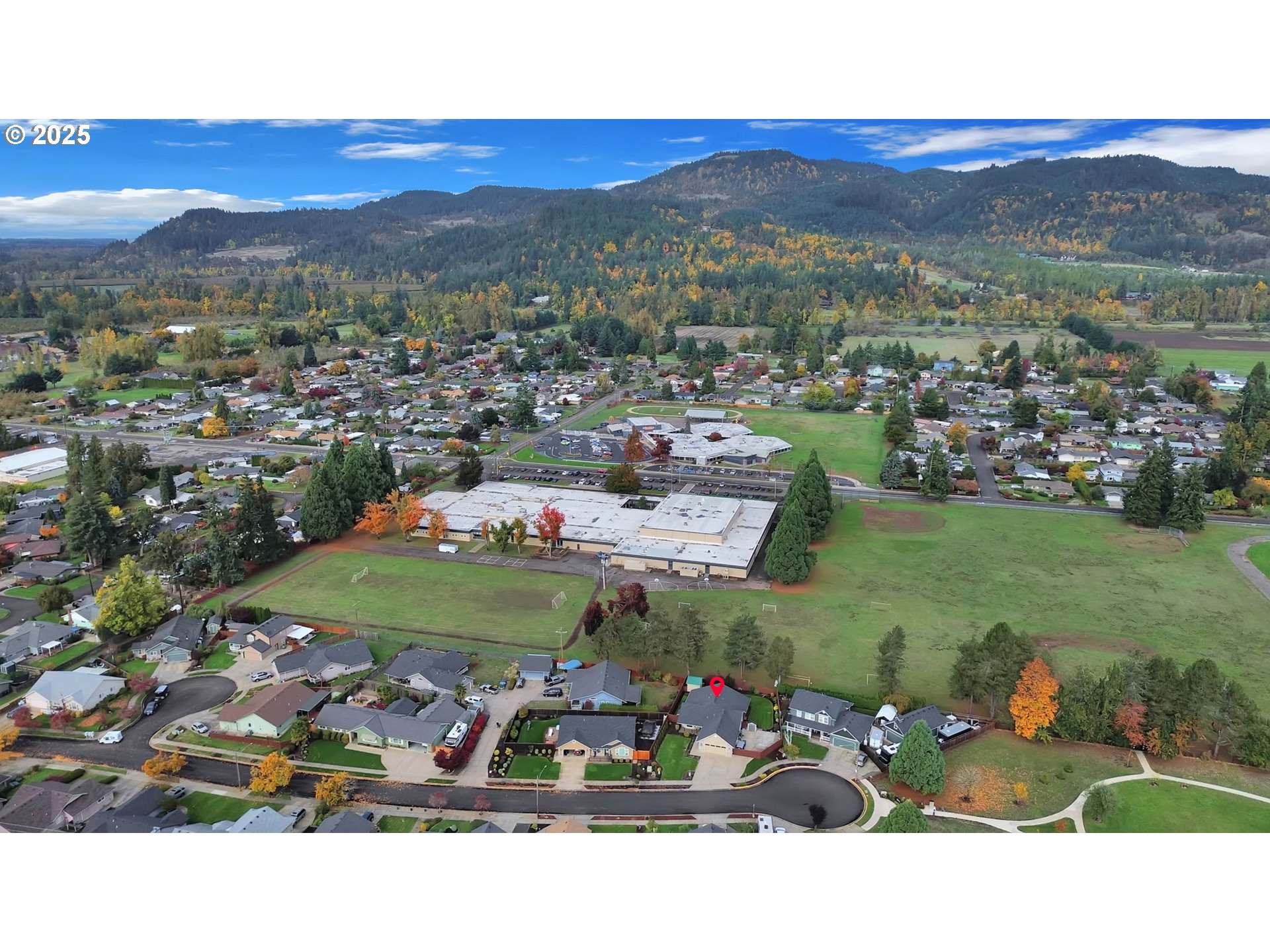 2458 Otto Street Springfield, OR 97477 - Photo 35 of 37 a view of a chairs and table in a yard