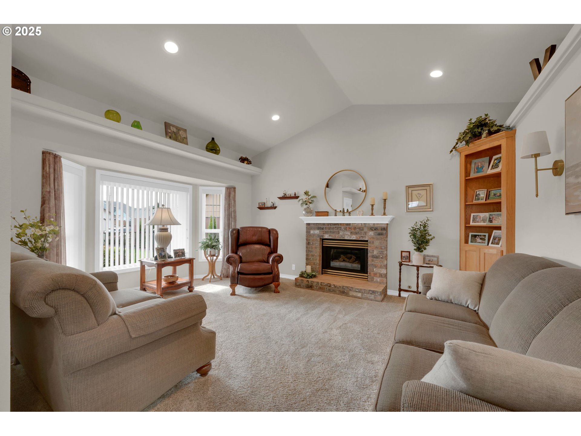 2458 Otto Street Springfield, OR 97477 - Photo 4 of 37 a living room with furniture and a fireplace
