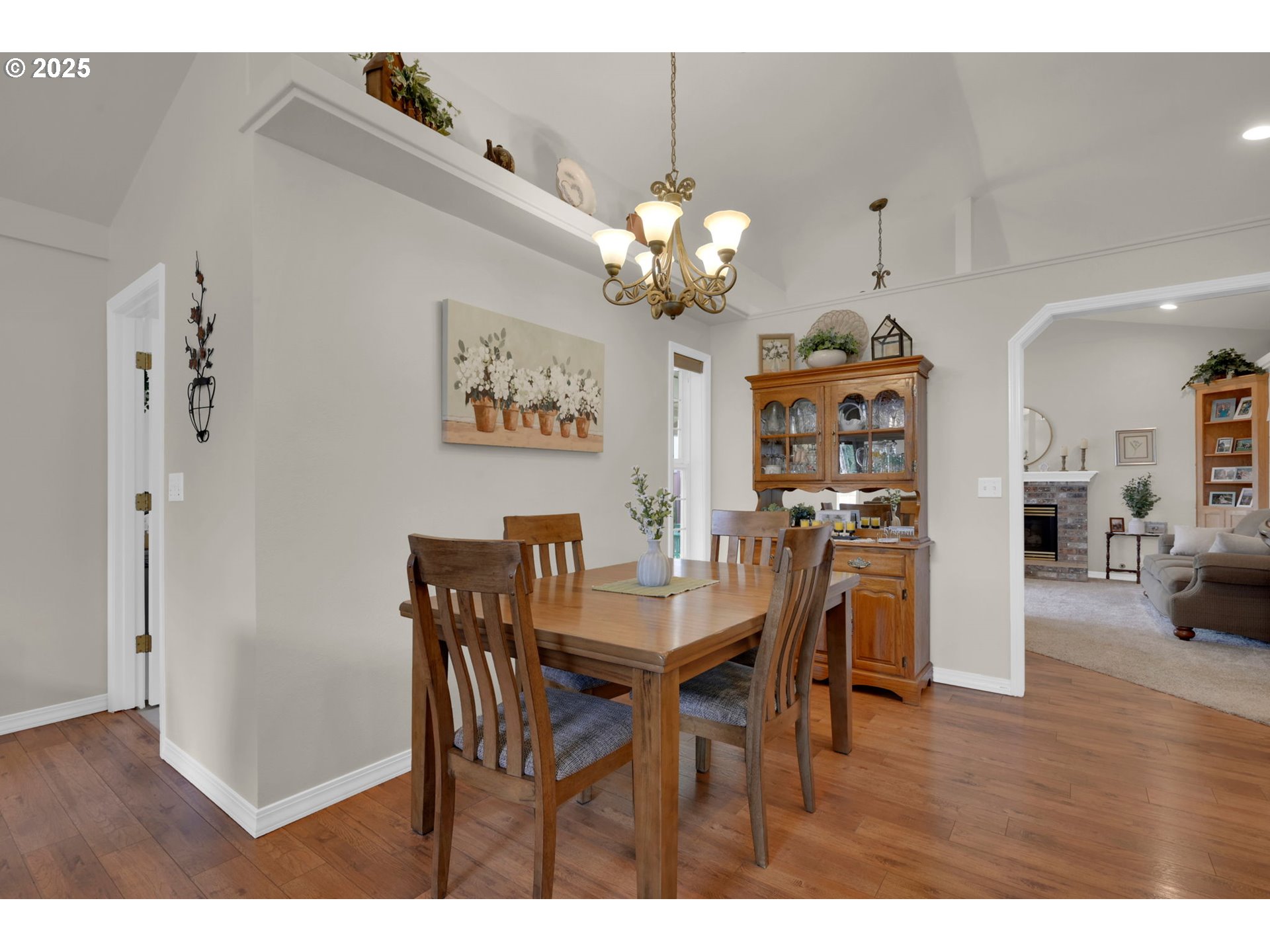 2458 Otto Street Springfield, OR 97477 - Photo 7 of 37 a view of a dining room with furniture and wooden floor