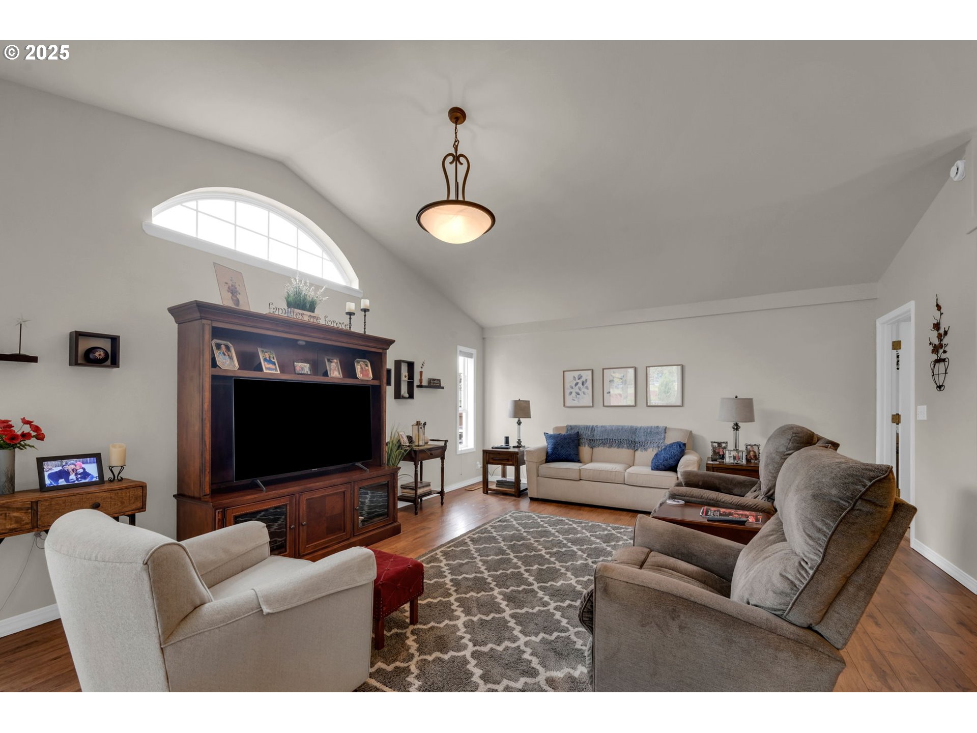 2458 Otto Street Springfield, OR 97477 - Photo 8 of 37 a living room with furniture and a flat screen tv