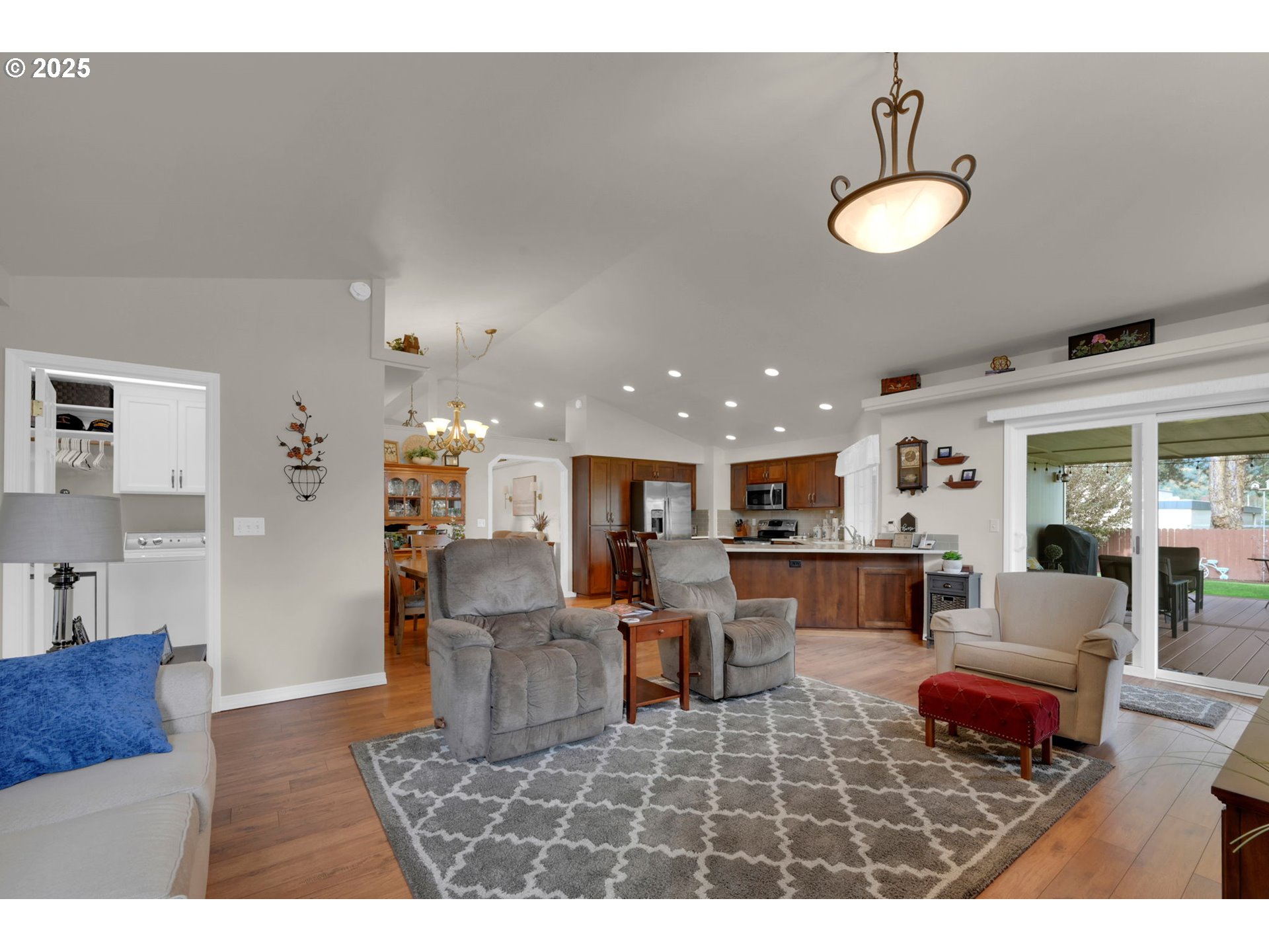 2458 Otto Street Springfield, OR 97477 - Photo 9 of 37 a living room with furniture kitchen view and a dining table