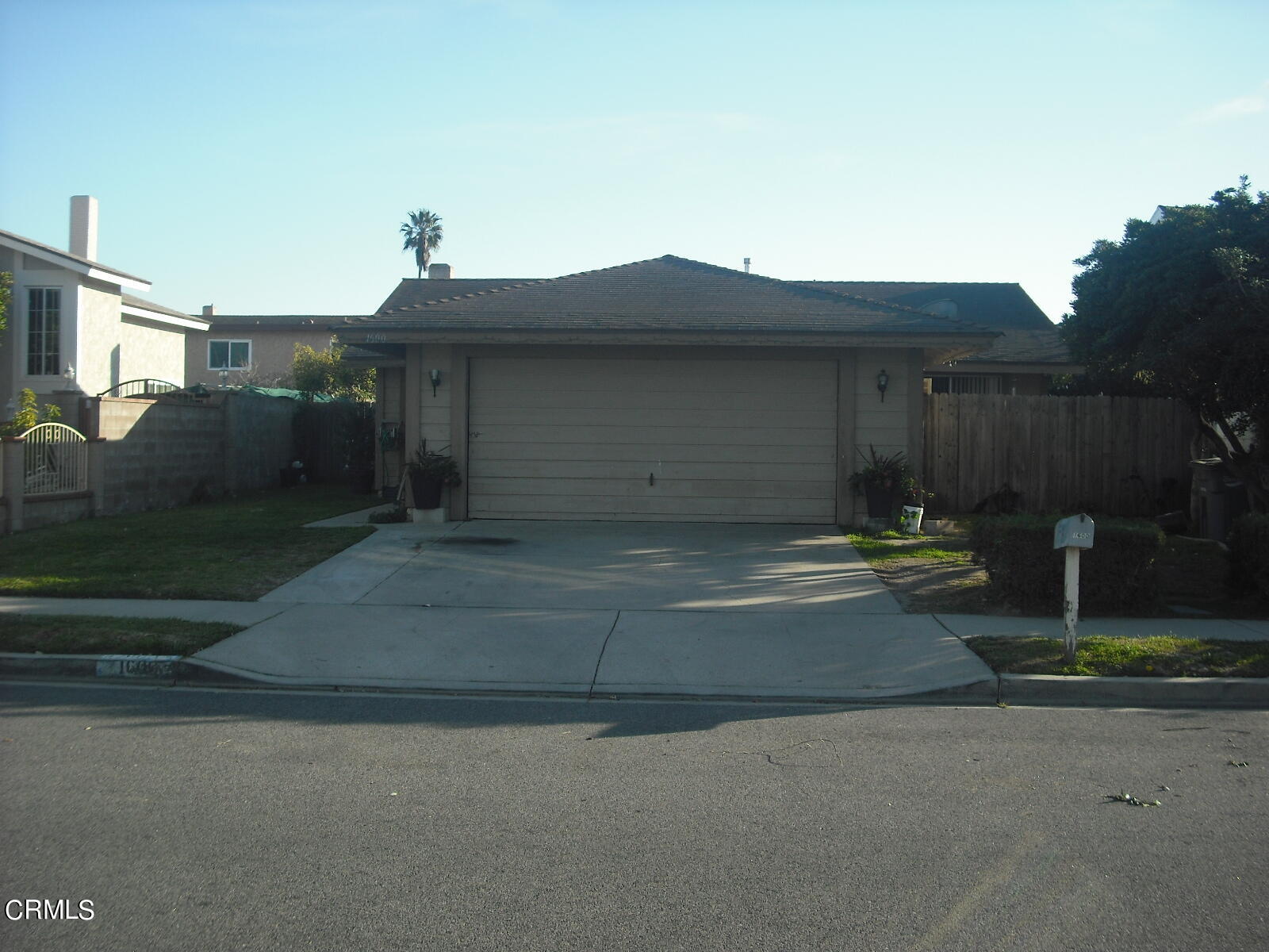 a view of backyard with seating space