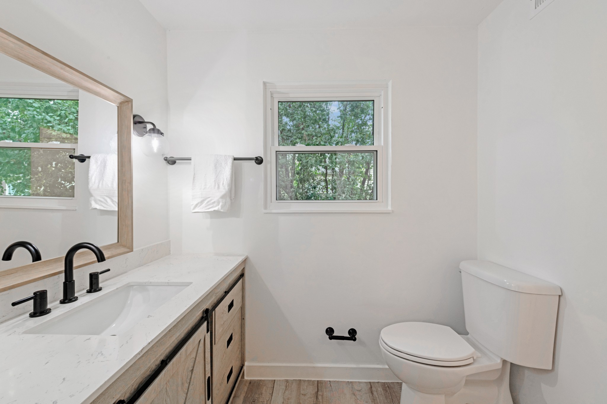 4000 Anderson Road, Unit 12 Nashville, TN 37217 - Photo 18 of 28 a bathroom with a sink a toilet and a window