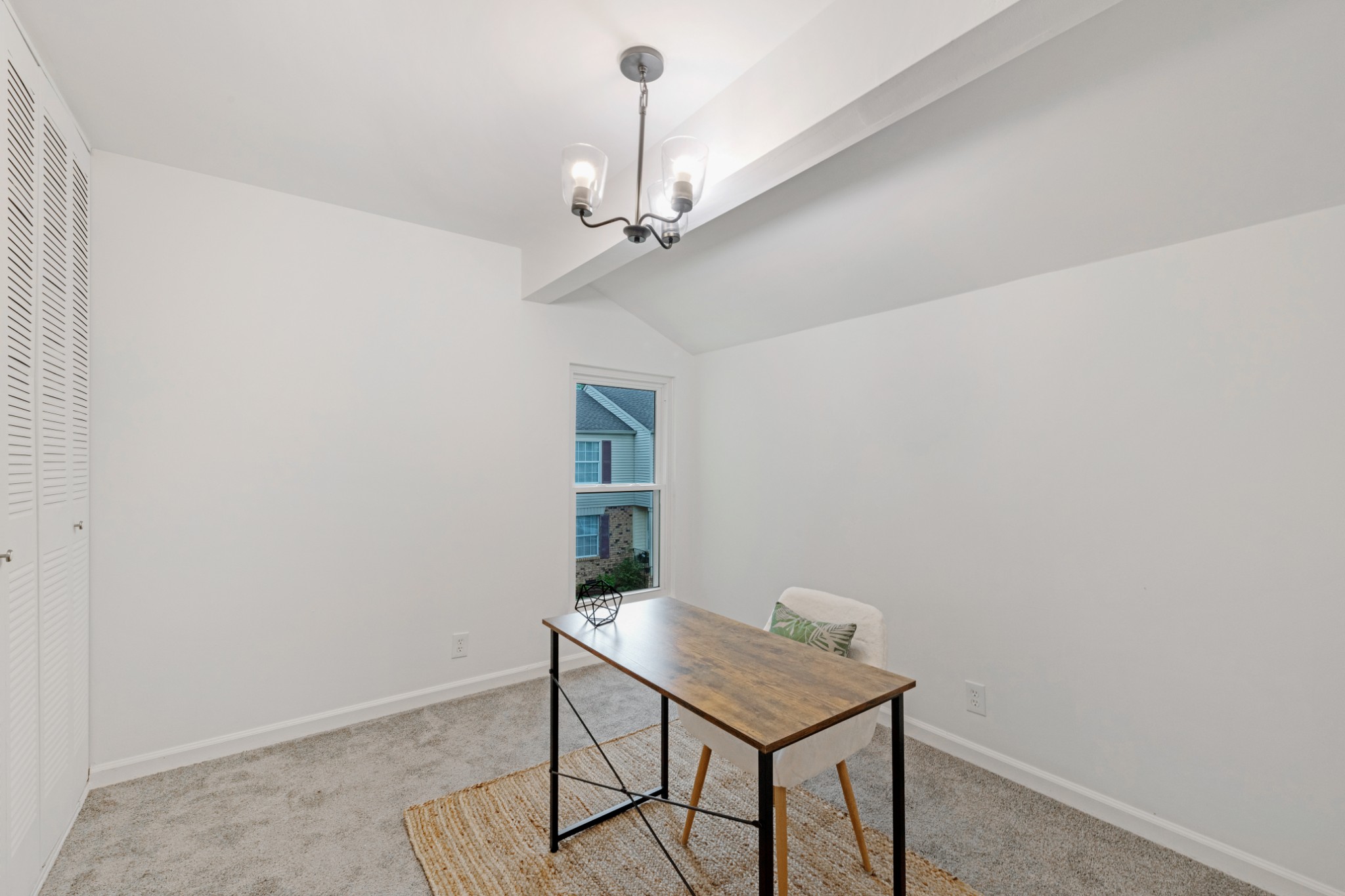 4000 Anderson Road, Unit 12 Nashville, TN 37217 - Photo 20 of 28 a view of a room that has a table and chairs in it