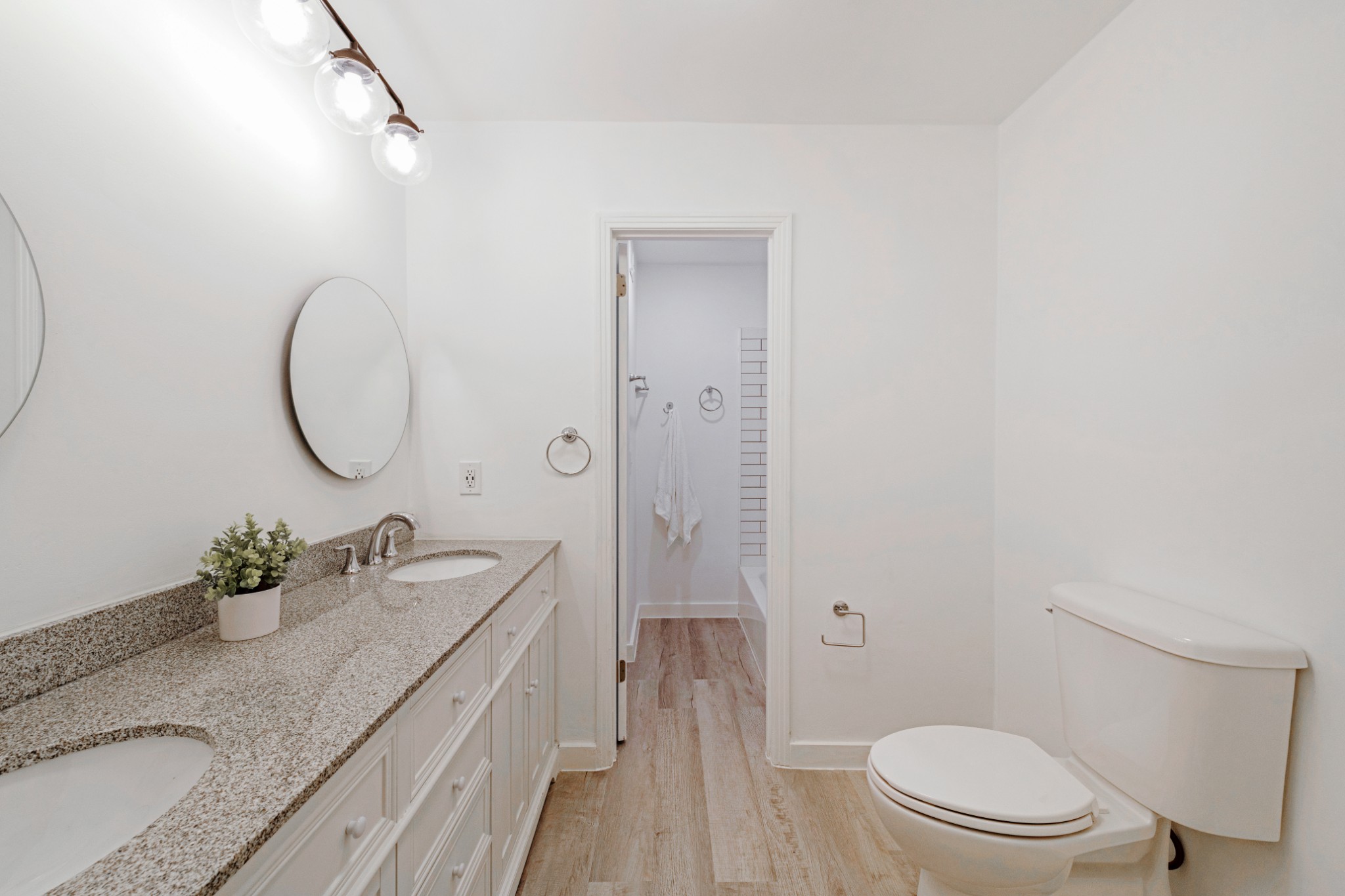 4000 Anderson Road, Unit 12 Nashville, TN 37217 - Photo 22 of 28 a bathroom with a granite countertop sink mirror vanity and toilet