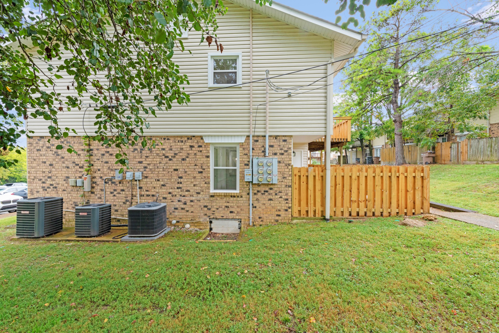 4000 Anderson Road, Unit 12 Nashville, TN 37217 - Photo 27 of 28 a view of a house with backyard and a tree
