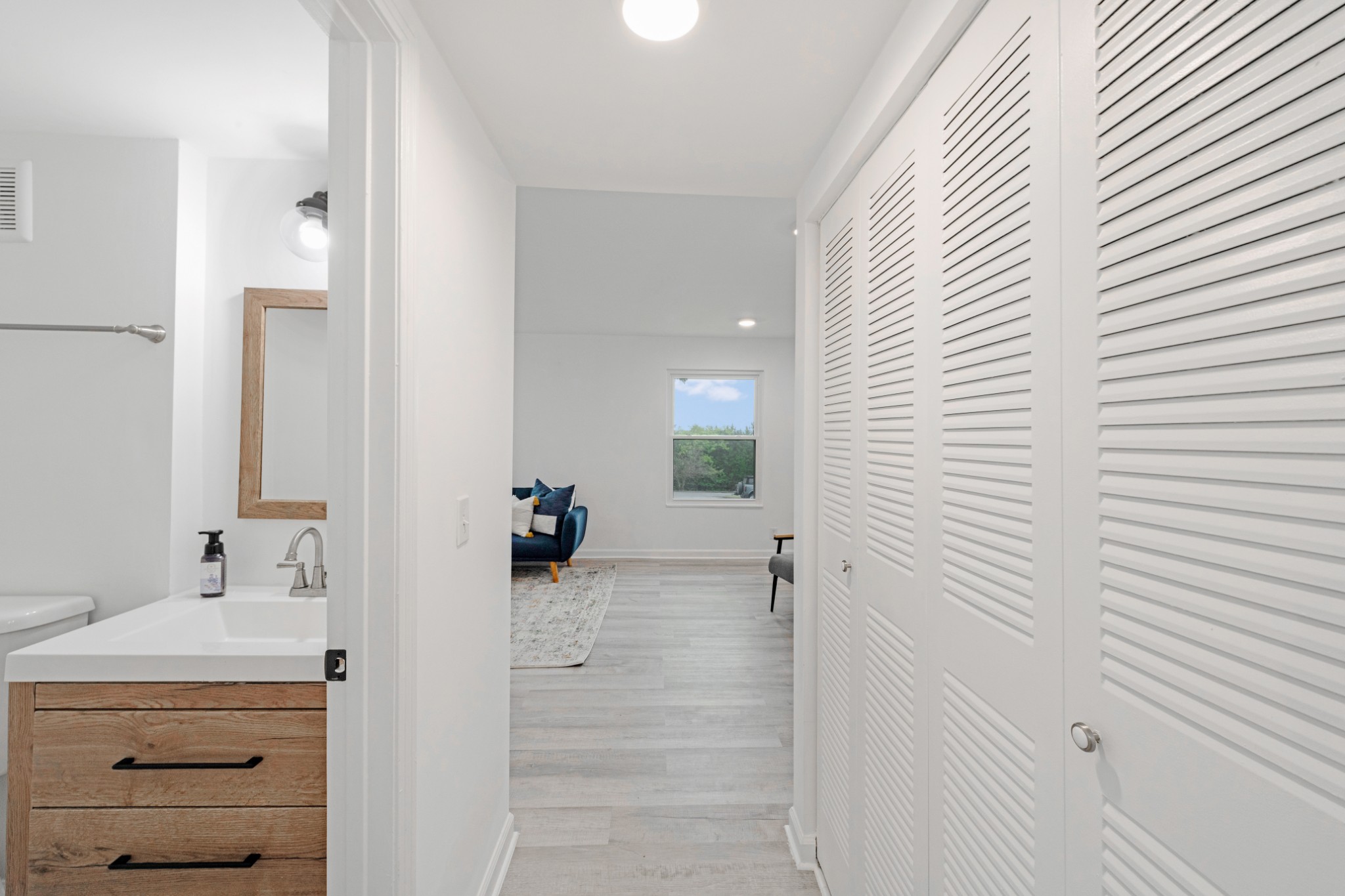 4000 Anderson Road, Unit 12 Nashville, TN 37217 - Photo 7 of 28 a bathroom with a sink a mirror and shower