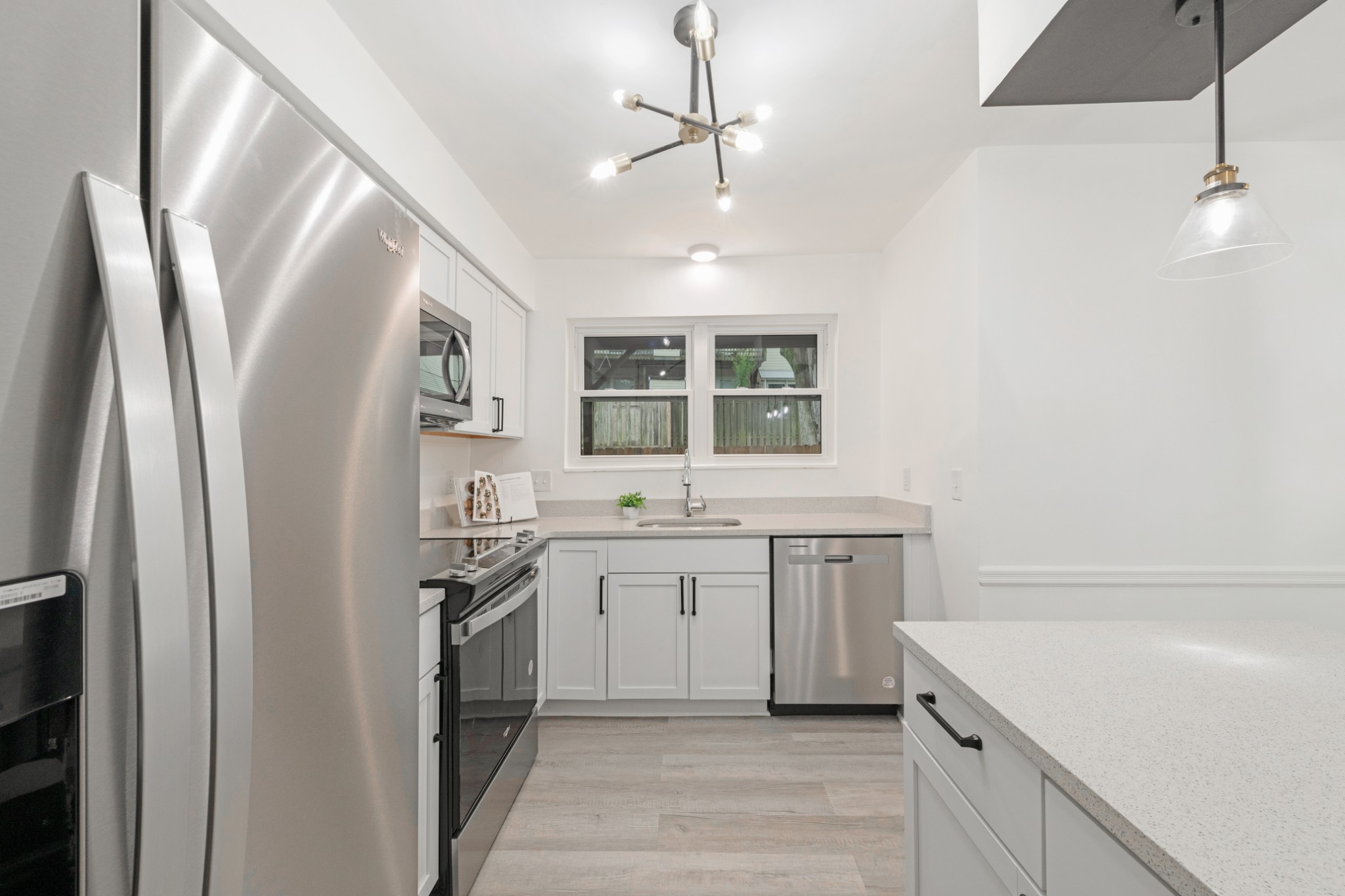 4000 Anderson Road, Unit 12 Nashville, TN 37217 - Photo 10 of 28 a kitchen with a sink stove and refrigerator