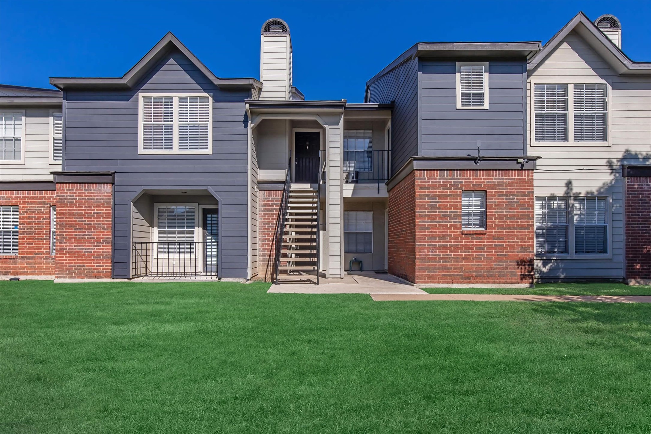 8301 Boat Club Road, Unit 923 Fort Worth, TX 76179 - Photo 38 of 42 a front view of a house with a yard