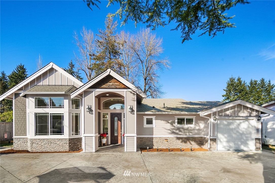 10902 Southeast 186th Street Renton, WA 98055 - Photo 4 of 32 a front view of a house with a porch