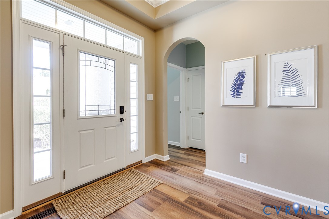 7538 South Franklins Way Quinton, VA 23141 - Photo 6 of 48 a view of a room with wooden floor and windows