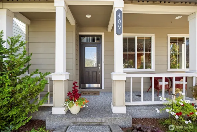 a front view of a house with a porch