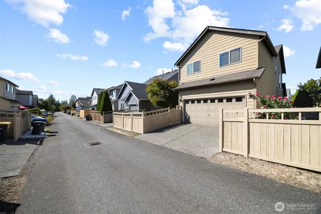 a view of a house with a street