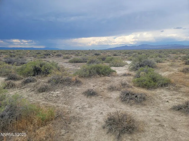 a view of an outdoor space with mountain view