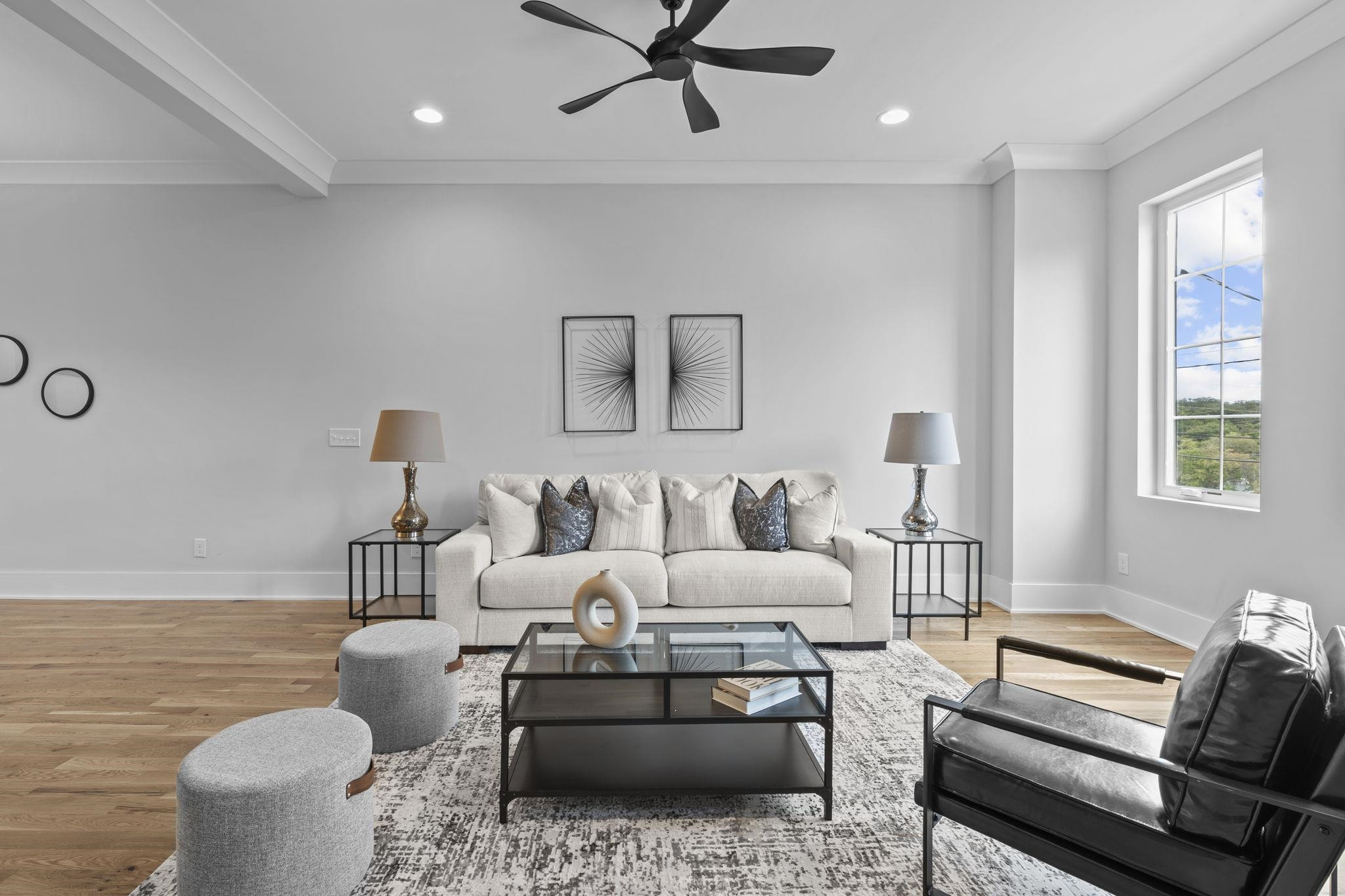 617 South West Street Raleigh, NC 27601 - Photo 11 of 44 a living room with furniture and a large window