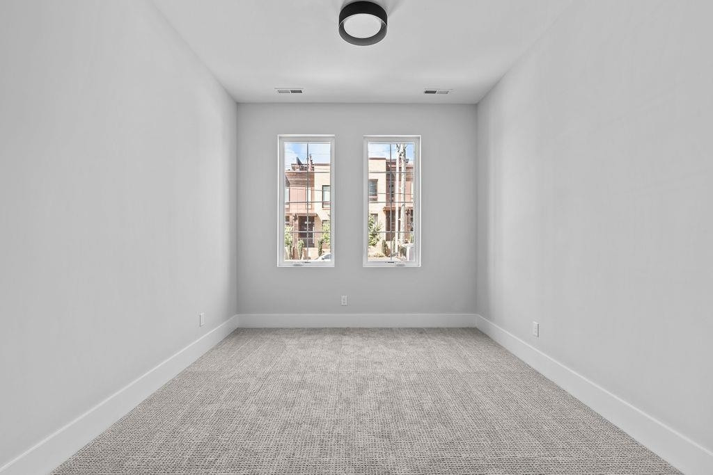 617 South West Street Raleigh, NC 27601 - Photo 24 of 44 an empty room with windows