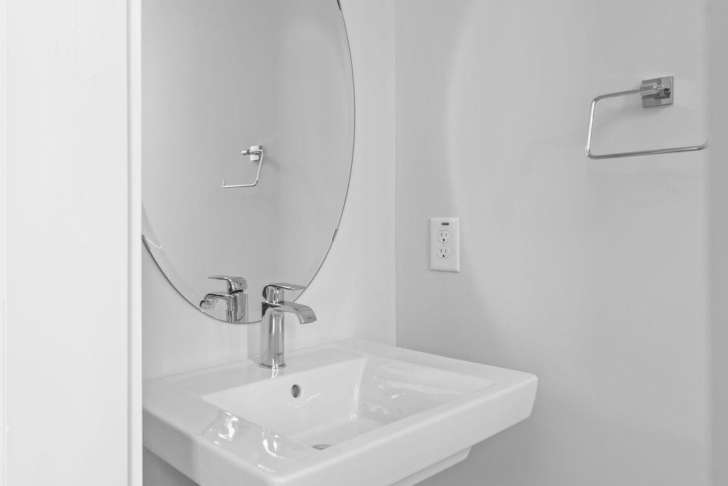 617 South West Street Raleigh, NC 27601 - Photo 28 of 44 a bathroom with a sink