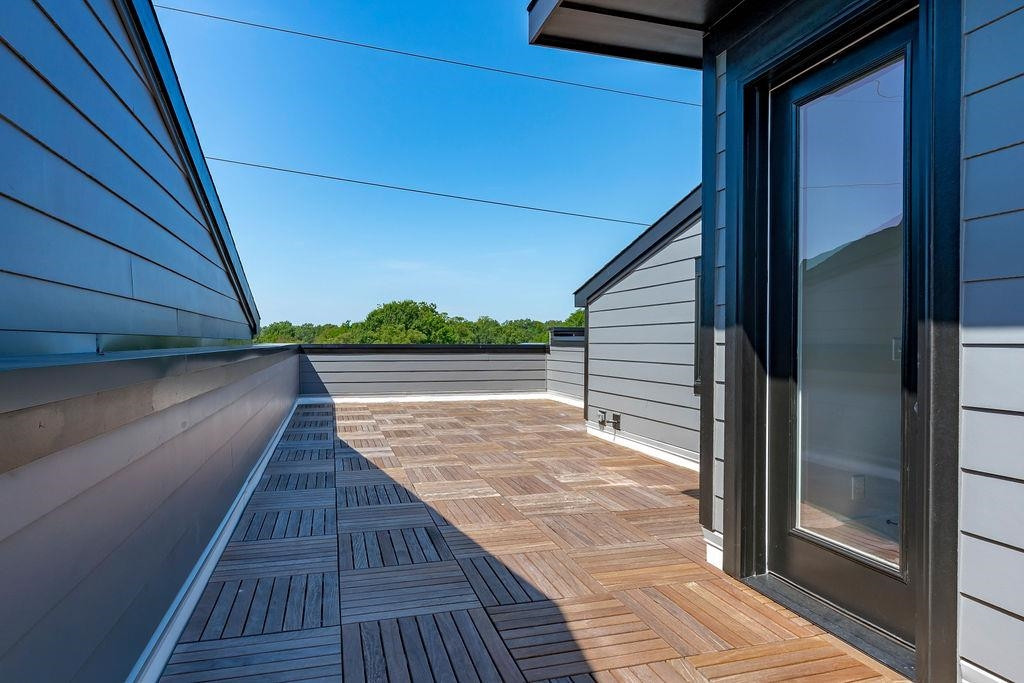 617 South West Street Raleigh, NC 27601 - Photo 29 of 44 a view of wooden floor and glass door