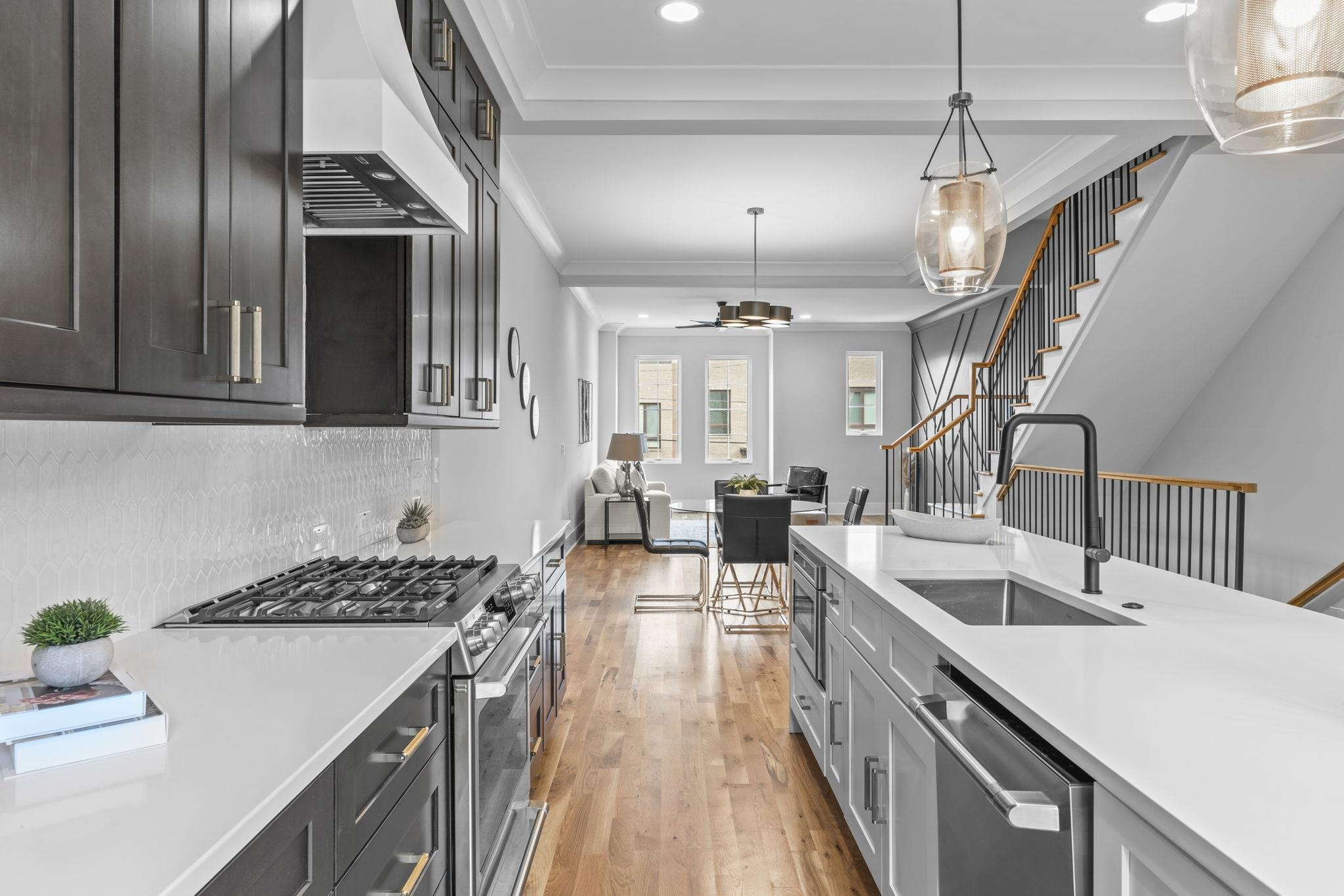 617 South West Street Raleigh, NC 27601 - Photo 3 of 44 a kitchen with lots of counter space a sink and appliances