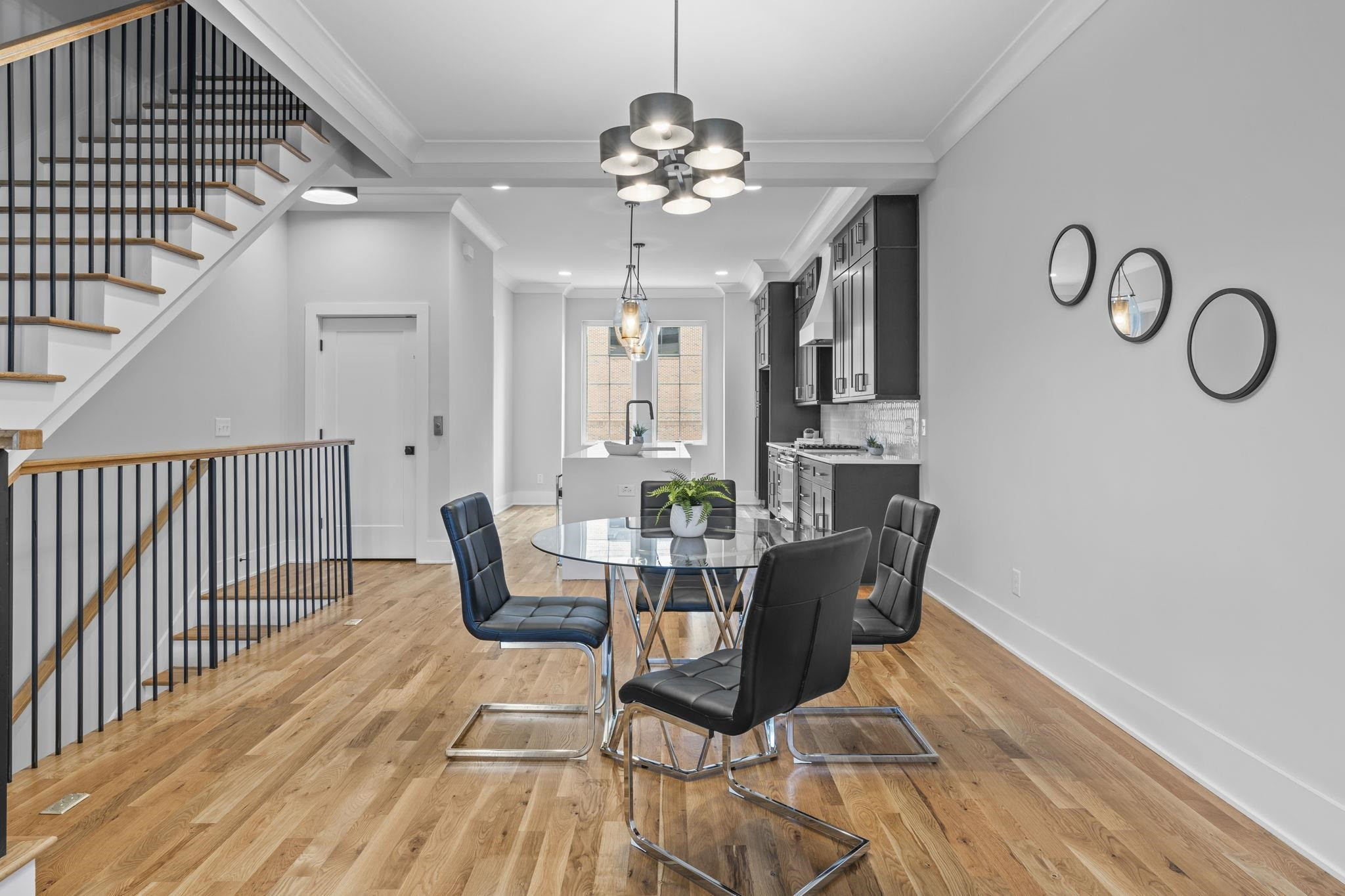 617 South West Street Raleigh, NC 27601 - Photo 7 of 44 a view of a dining room with furniture and wooden floor