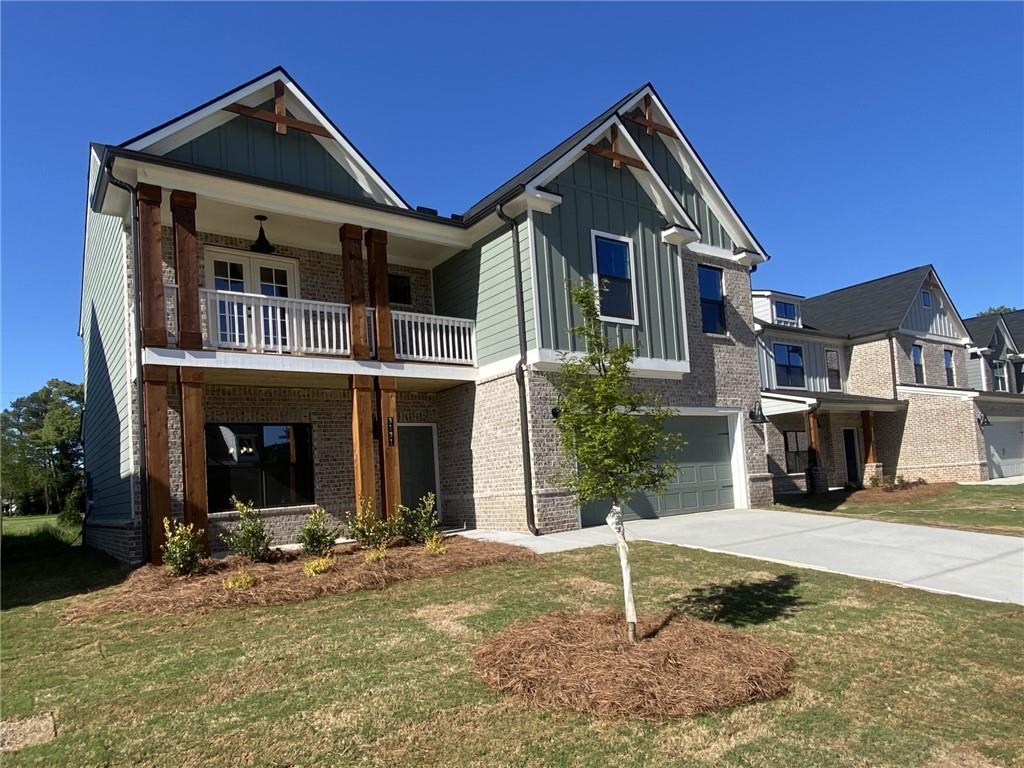 a front view of a house with yard