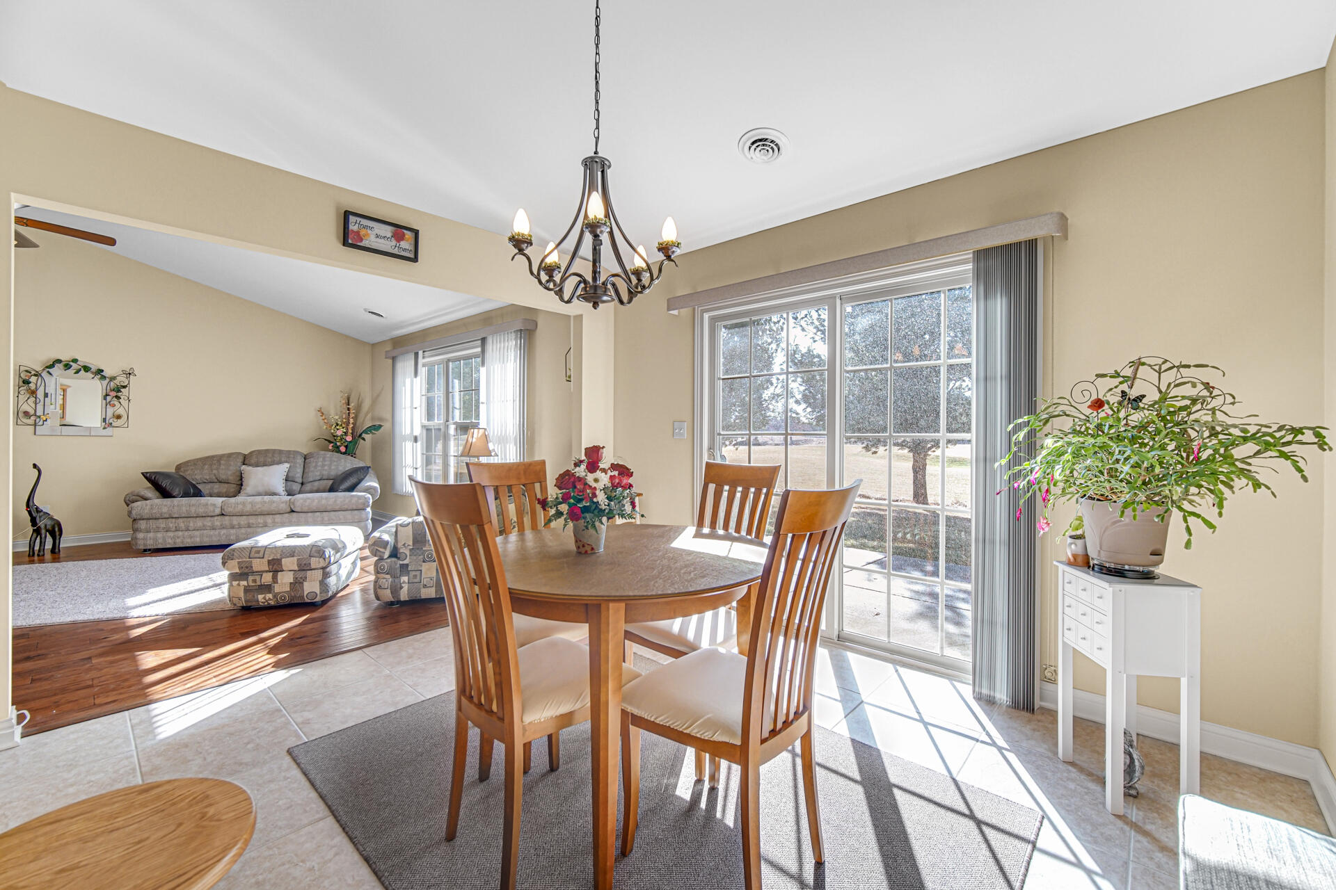 805 Veterans Lane Crown Point, IN 46307 - Photo 15 of 34 a view of a dining room with furniture window and wooden floor