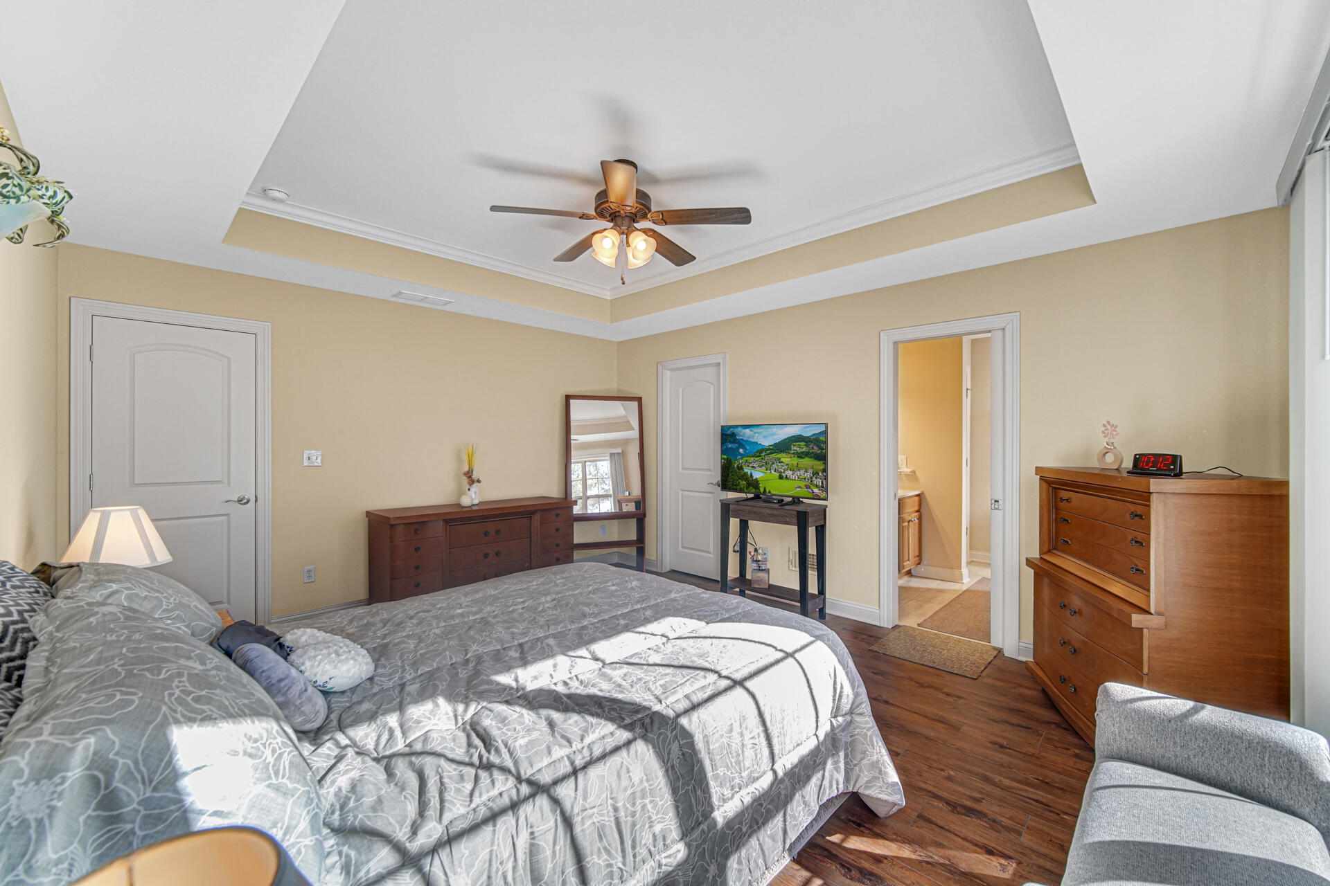805 Veterans Lane Crown Point, IN 46307 - Photo 18 of 34 a bedroom with a bed and wooden floor