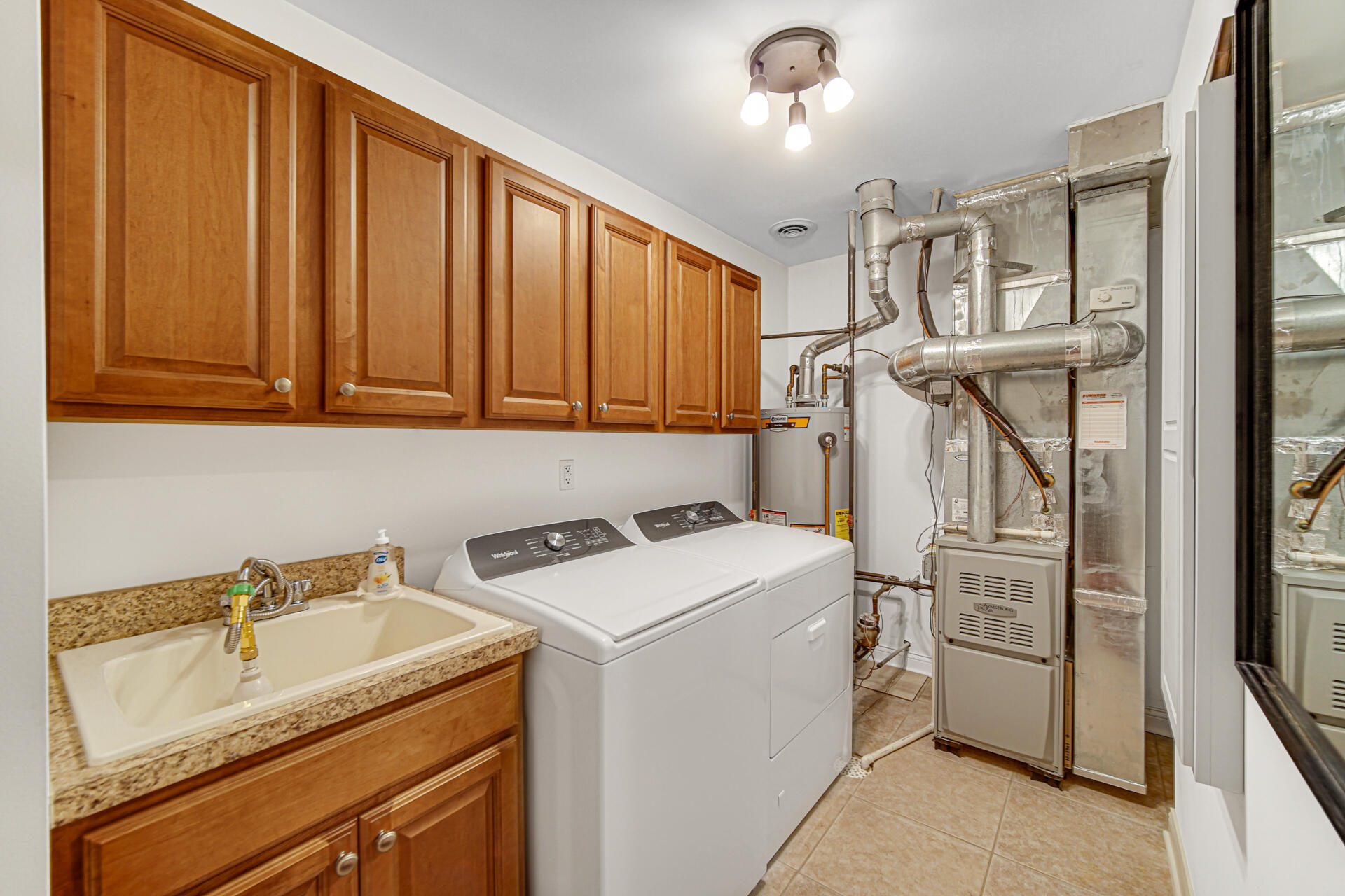 805 Veterans Lane Crown Point, IN 46307 - Photo 23 of 34 a utility room with dryer and washer