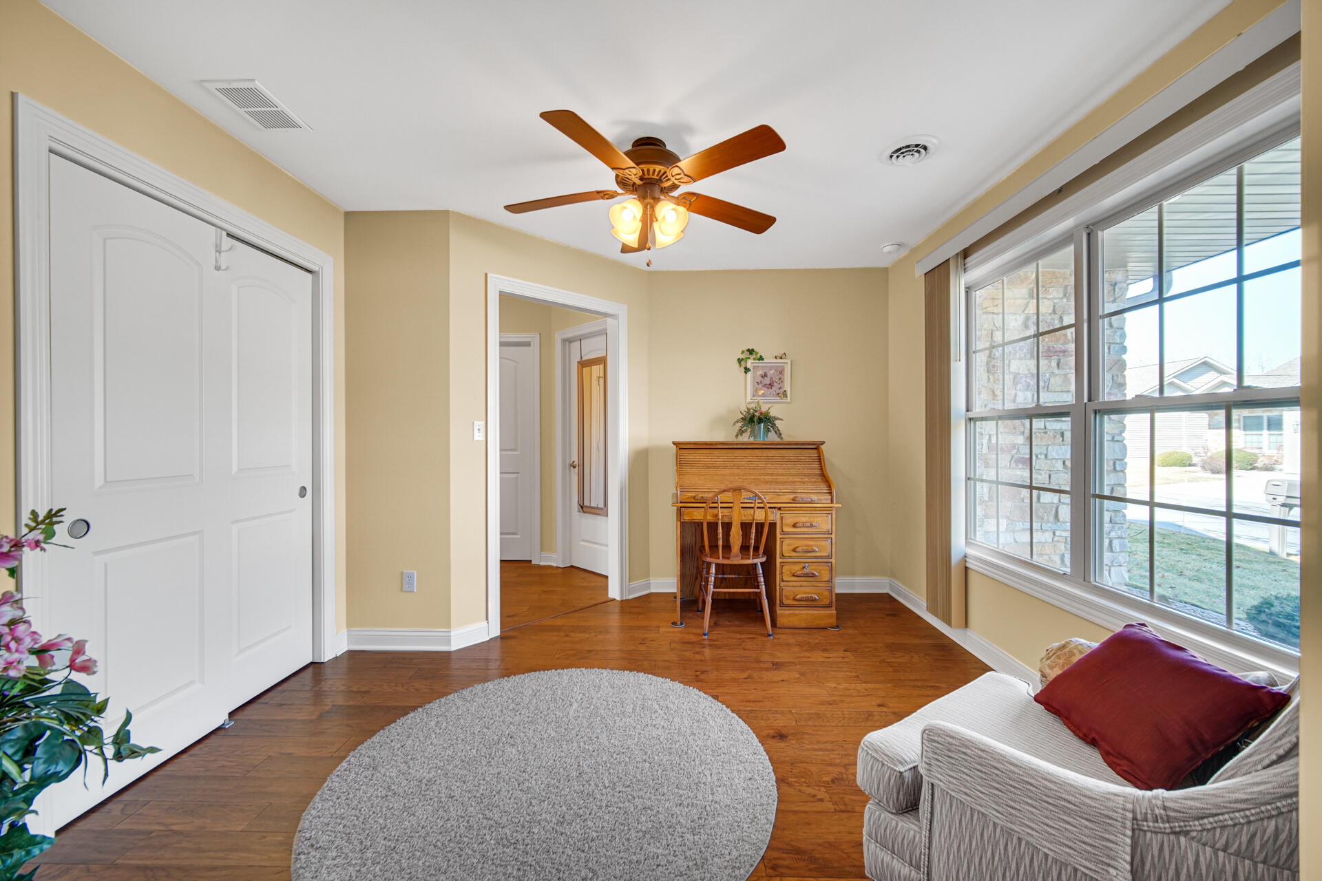 805 Veterans Lane Crown Point, IN 46307 - Photo 6 of 34 a bedroom with furniture and a large window